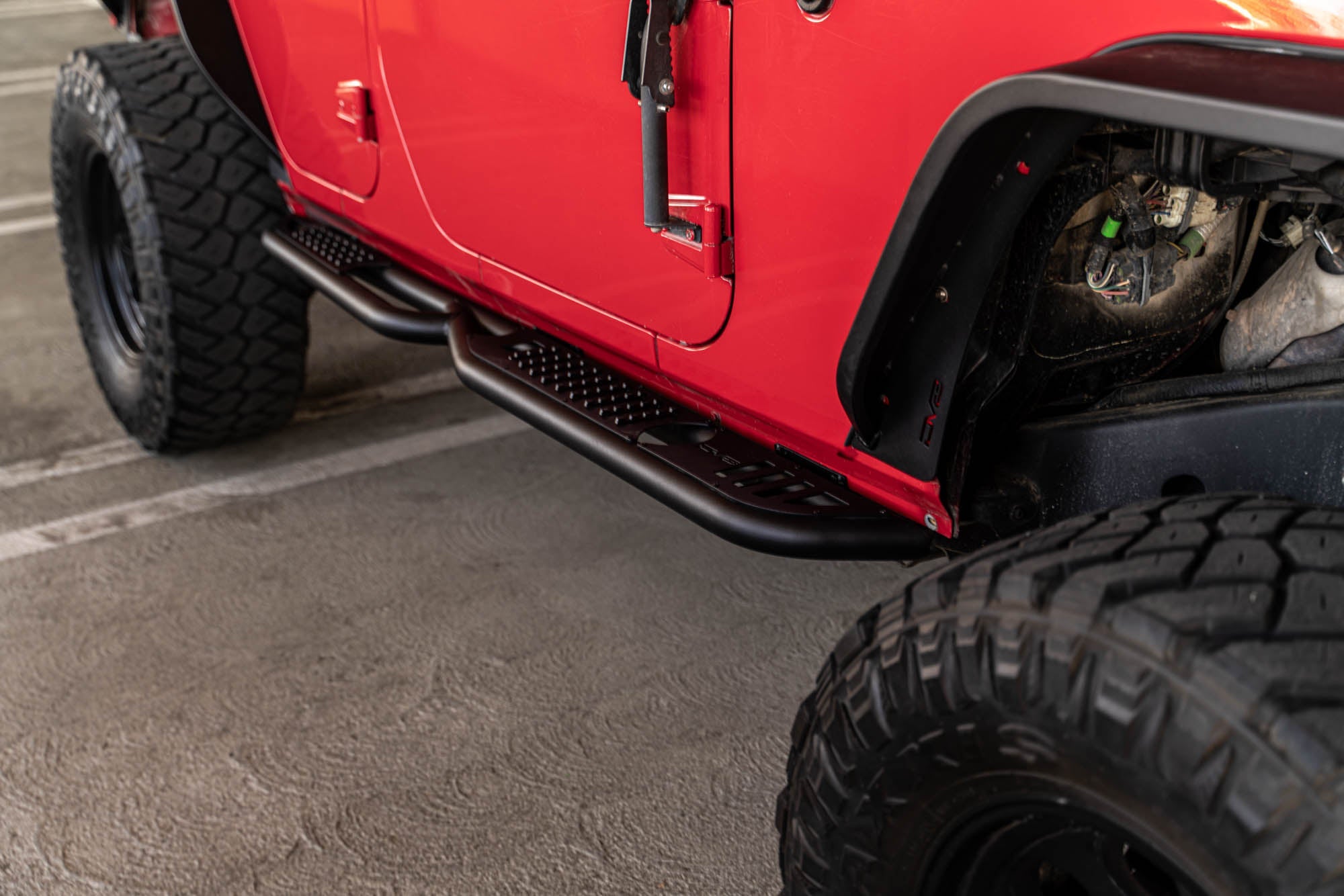2007-2018-4-Door-Jeep-Wrangler-JK-OE-Plus-Side-Steps_Installed-15 - NVMOS