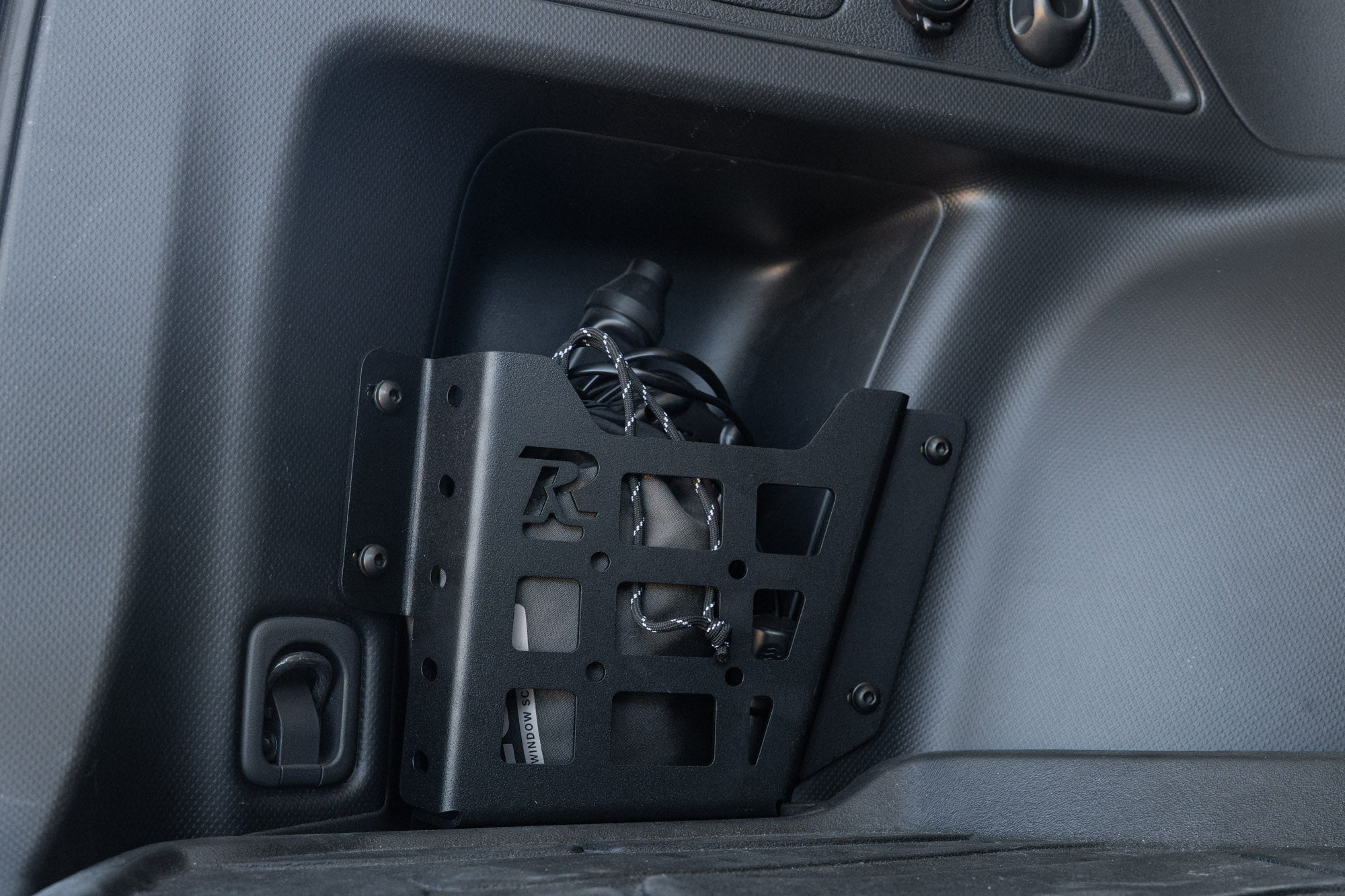 Subaru Forester rear cargo pocket molle panel with gear storage installed