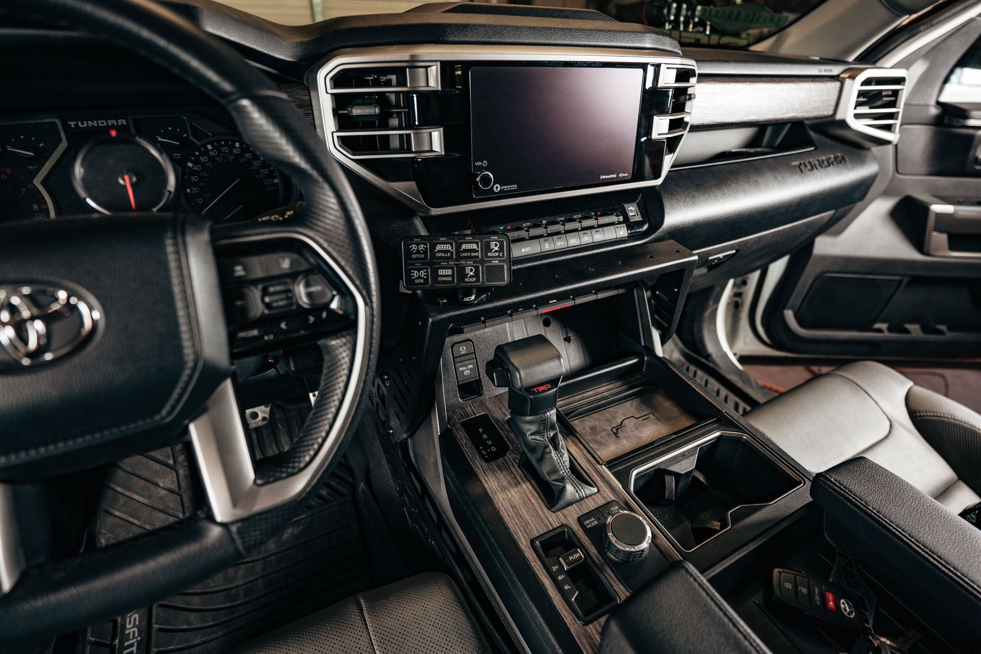 2022-2023-Toyota-Tundra-Center-Console-Molle-Panels-_-Device-Bridge_Installed_2 - NVMOS