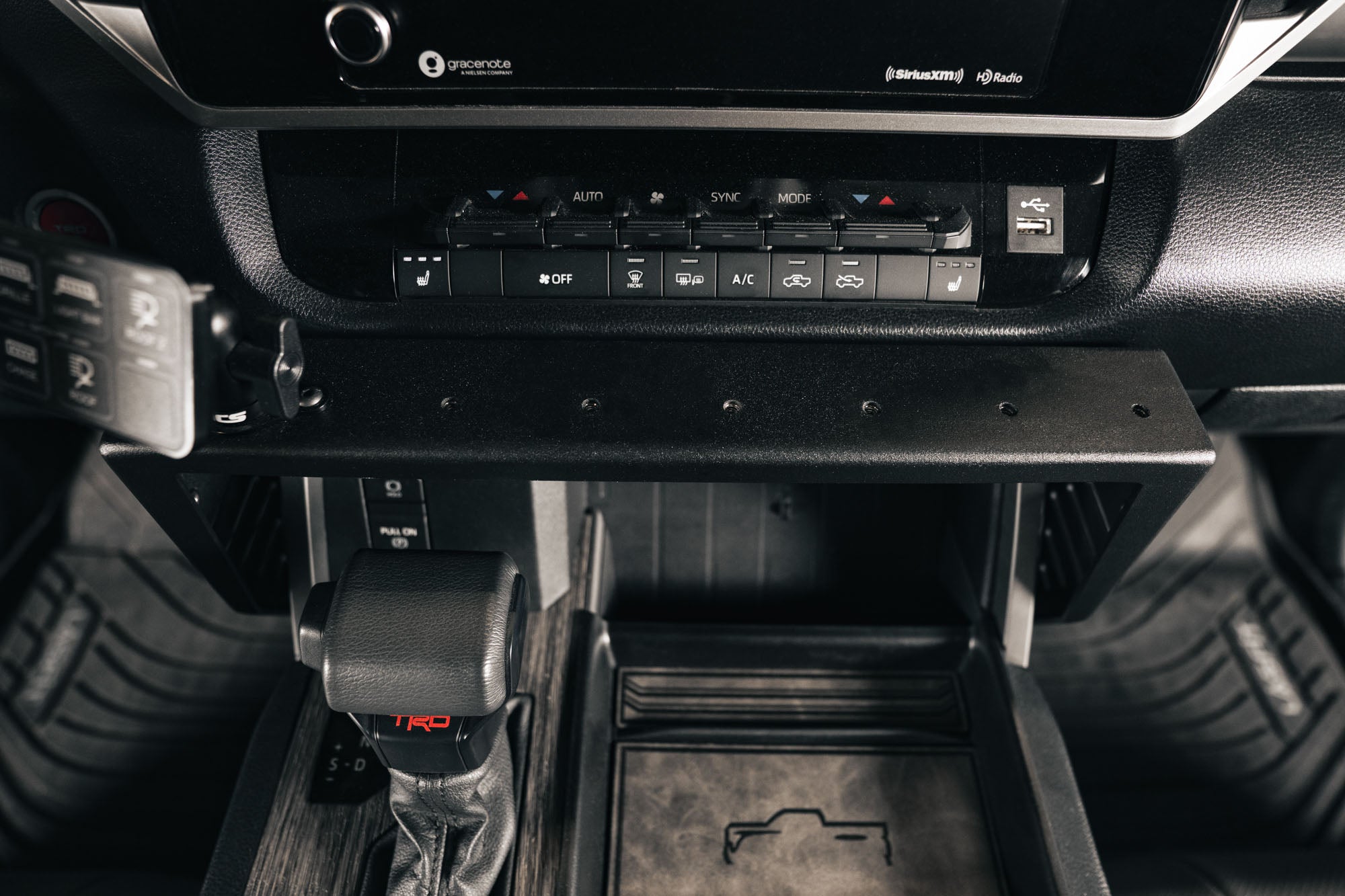 2022-2023-Toyota-Tundra-Center-Console-Molle-Panels-_-Device-Bridge_Installed_5 - NVMOS