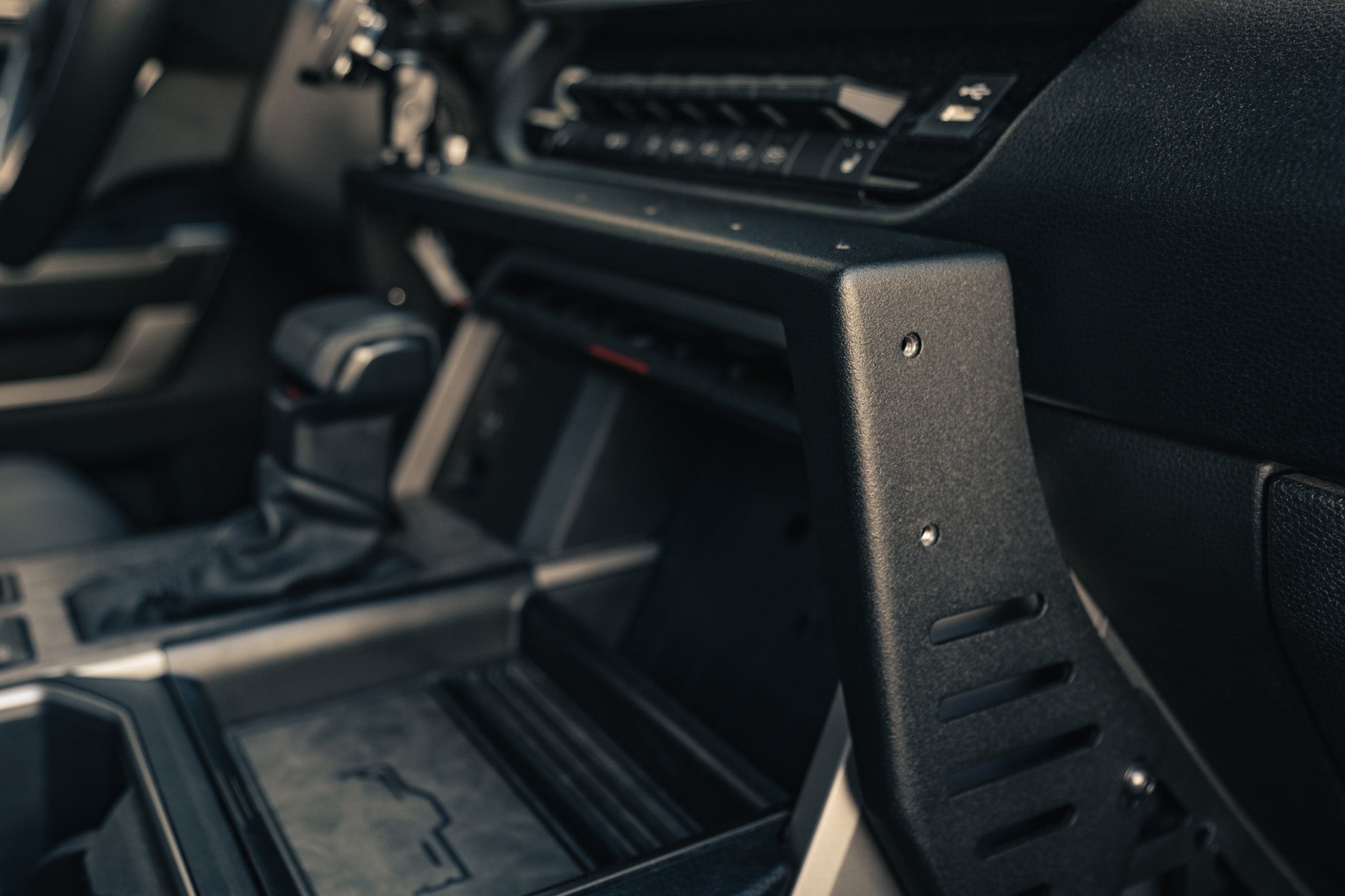 2022-2023-Toyota-Tundra-Center-Console-Molle-Panels-_-Device-Bridge_Installed_6 - NVMOS