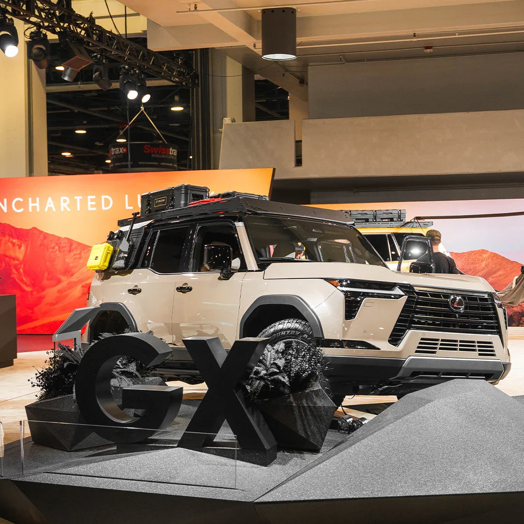 2024 Lexus GX550 SUV with overlanding gear on display at automotive expo