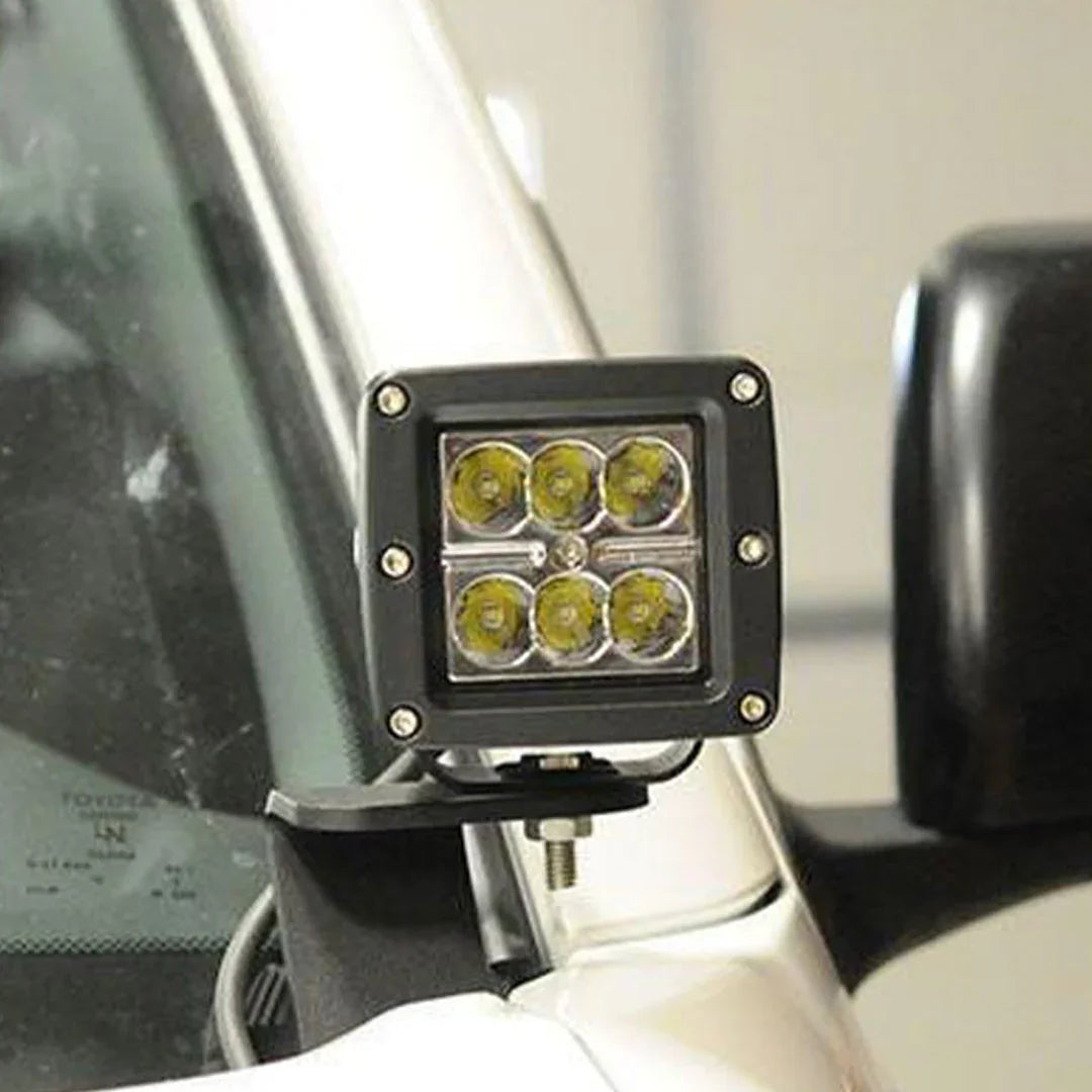 Toyota Tacoma 2nd Gen ditch light bracket with mounted LED cube light on vehicle