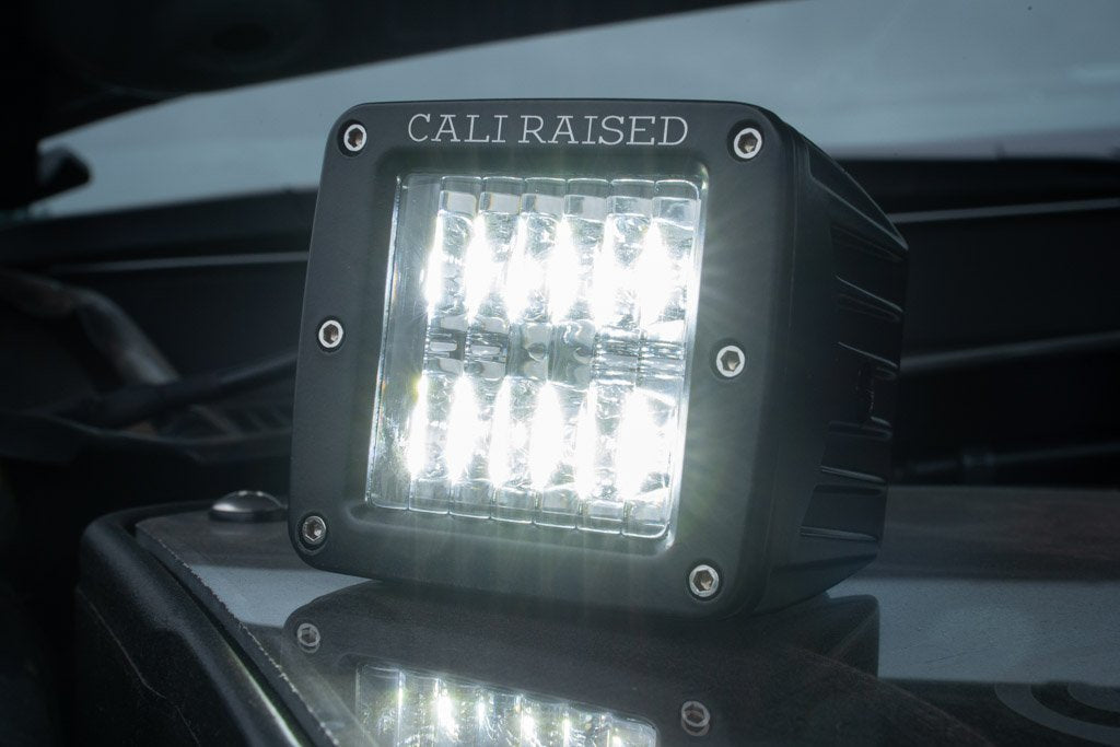 LED off-road pod light illuminated on vehicle, ideal for overlanding and adventure vehicles