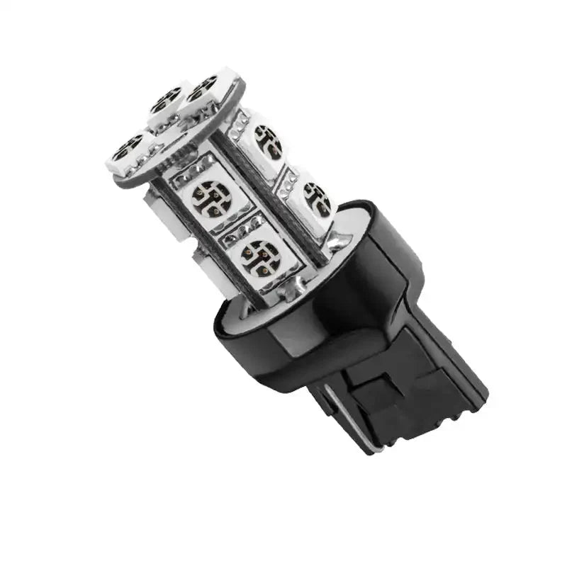 Close-up of an LED automotive light bulb with black base, suitable for vehicle accessory upgrades.
