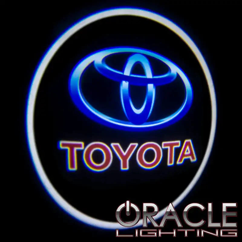 Illuminated Toyota logo car door projector light by Oracle Lighting, glowing blue and white.