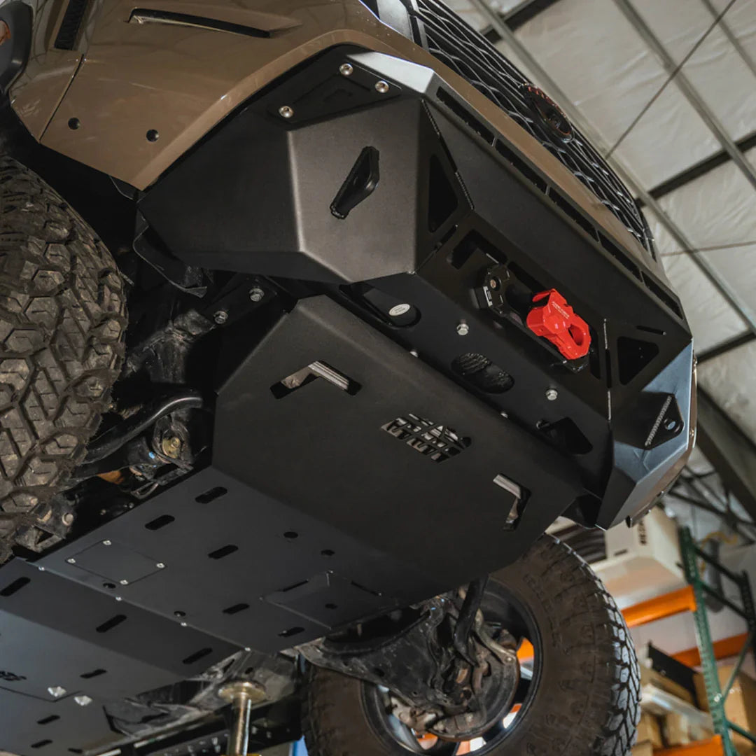 3rd gen Nissan Frontier front skid plate installed, black steel, off-road protection