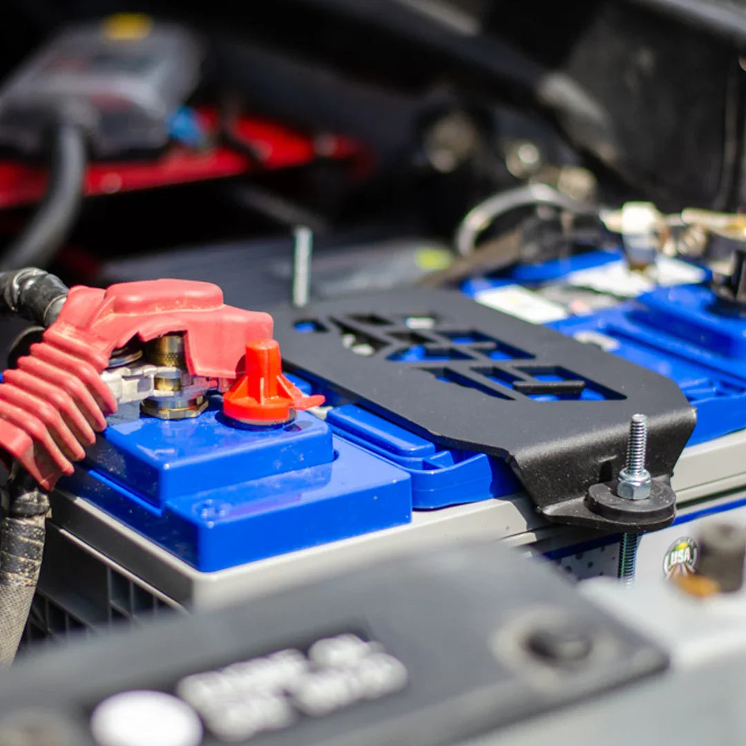 Toyota 4Runner Group 31 battery tray installed in engine bay with blue battery