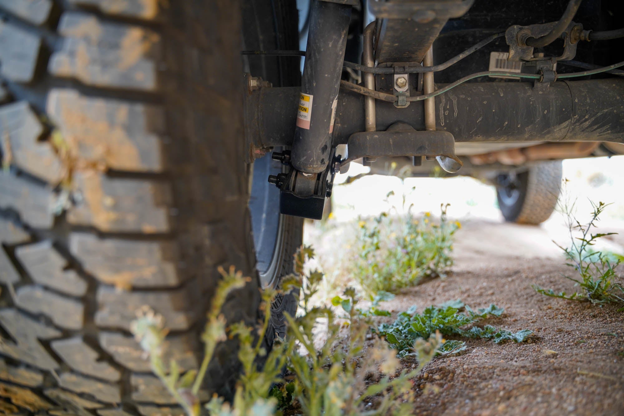 3rd-gen-Toyota-Tacoma-Rear-Shock-Skid-Plates-Installed-07 - NVMOS