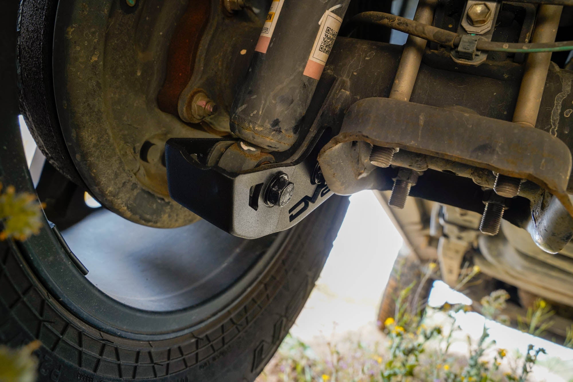 3rd-gen-Toyota-Tacoma-Rear-Shock-Skid-Plates-Installed-09 - NVMOS