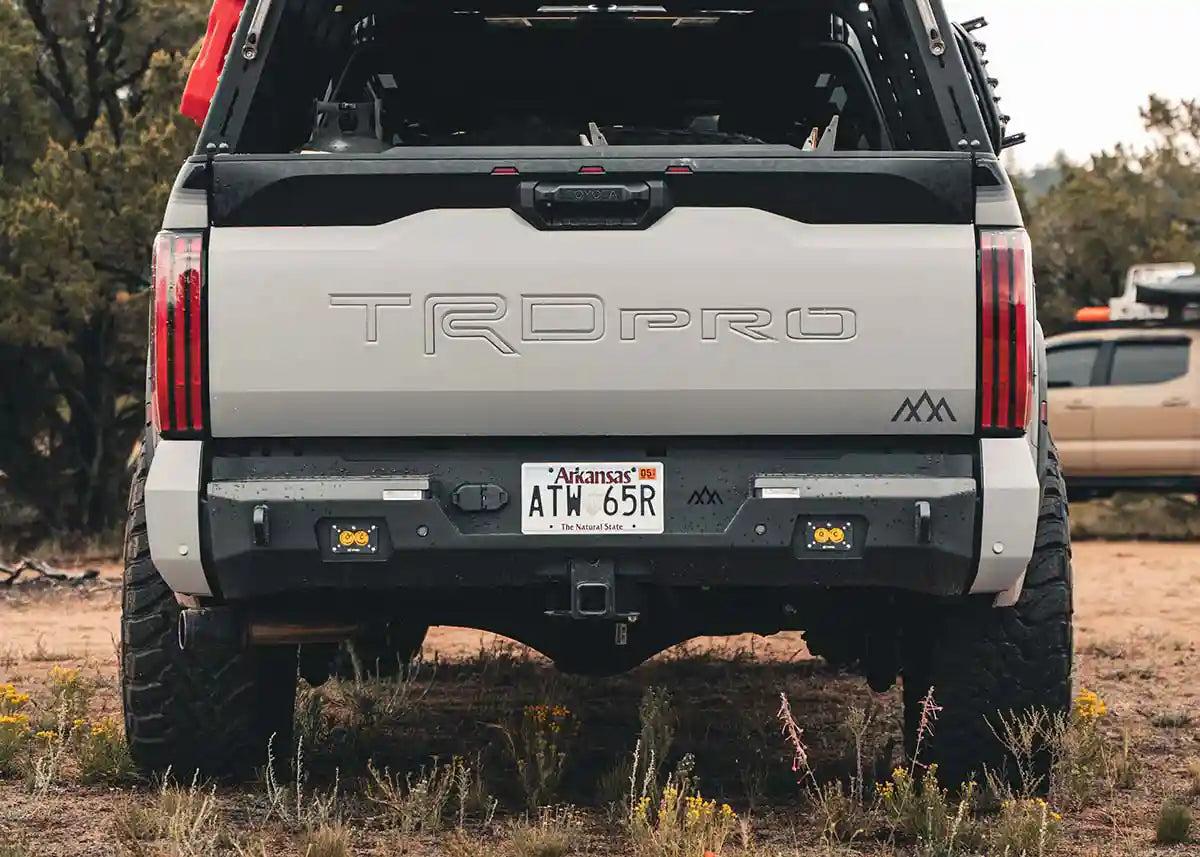 White Toyota Tundra with Backwoods Adventure Mods 2022+ 3rd Gen Tundra Rear Bumper installed