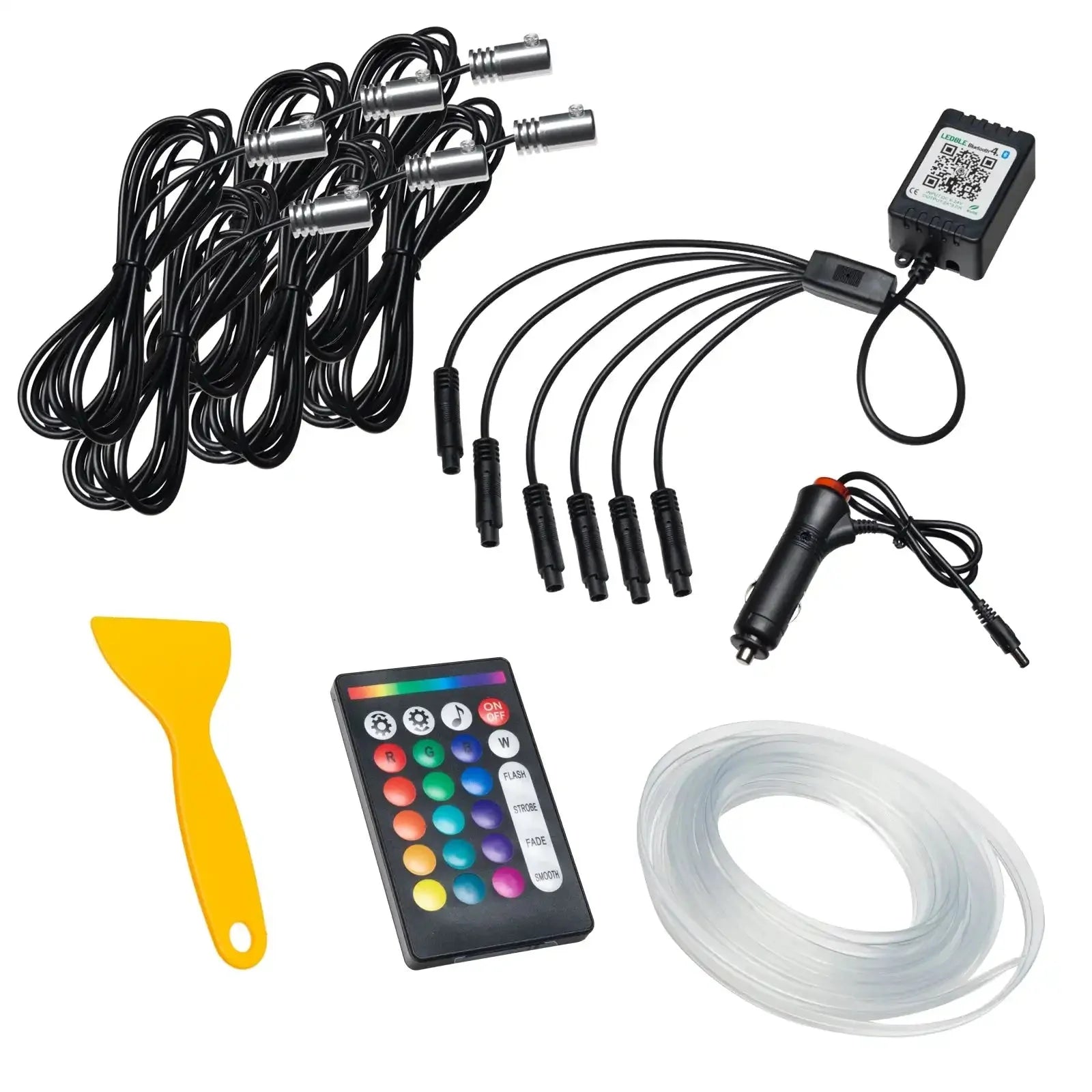 LED car interior ambient light kit with remote, cables, adapter, and plastic tool