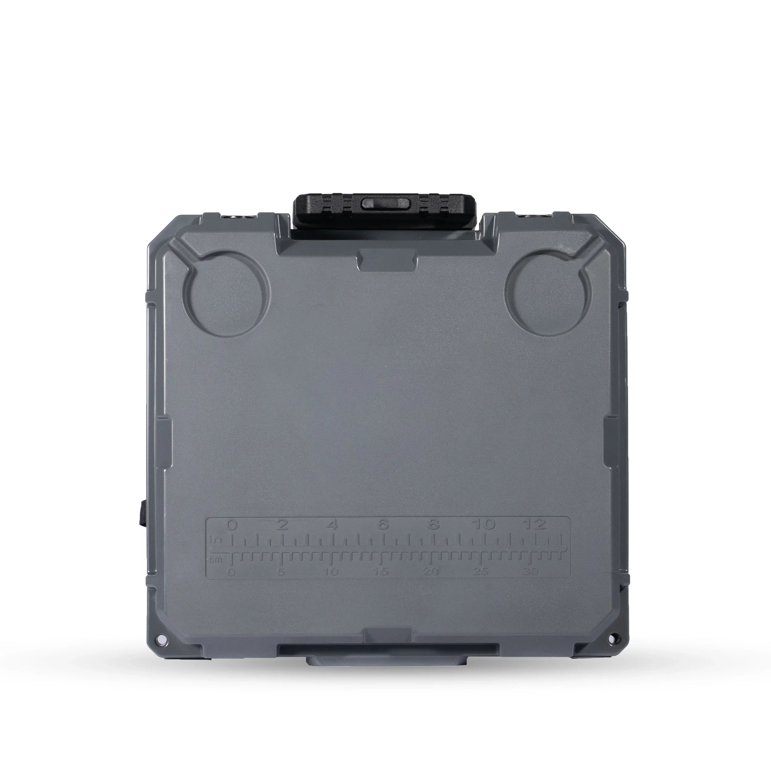 Gray rugged hard case with latching handle, ruler markings, designed for overlanding gear storage
