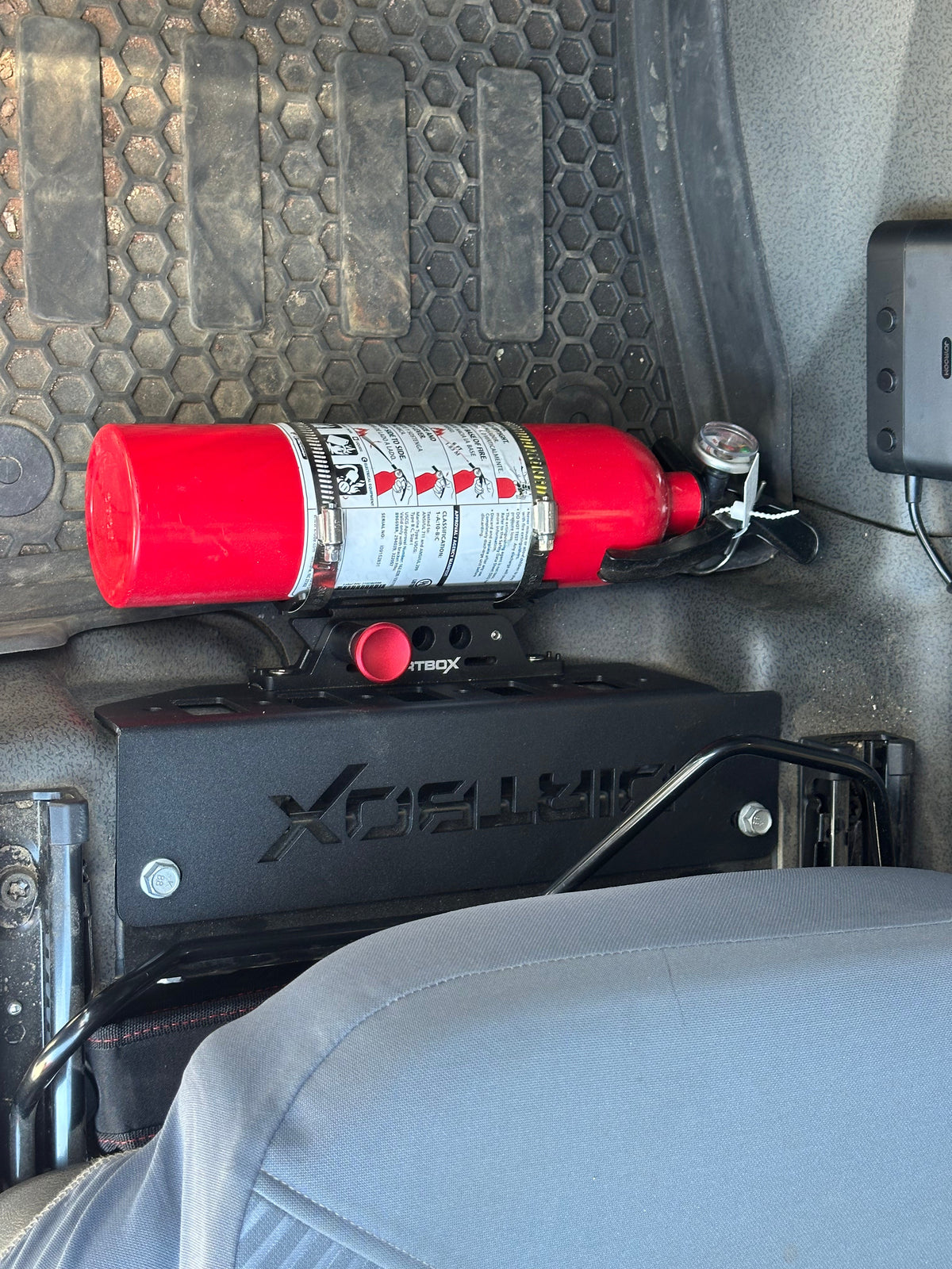 Dirtbox under-seat fire extinguisher mount for INEOS Grenadier and Quartermaster