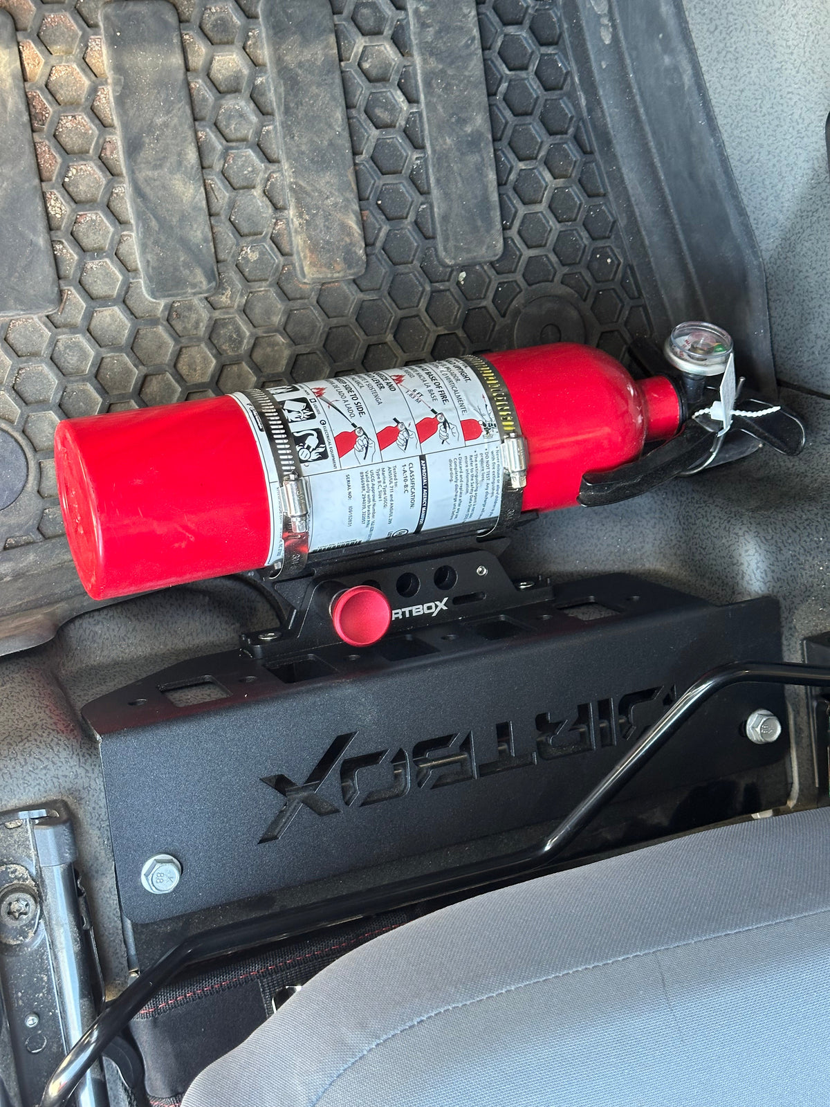 Dirtbox under-seat fire extinguisher mount for INEOS Grenadier and Quartermaster