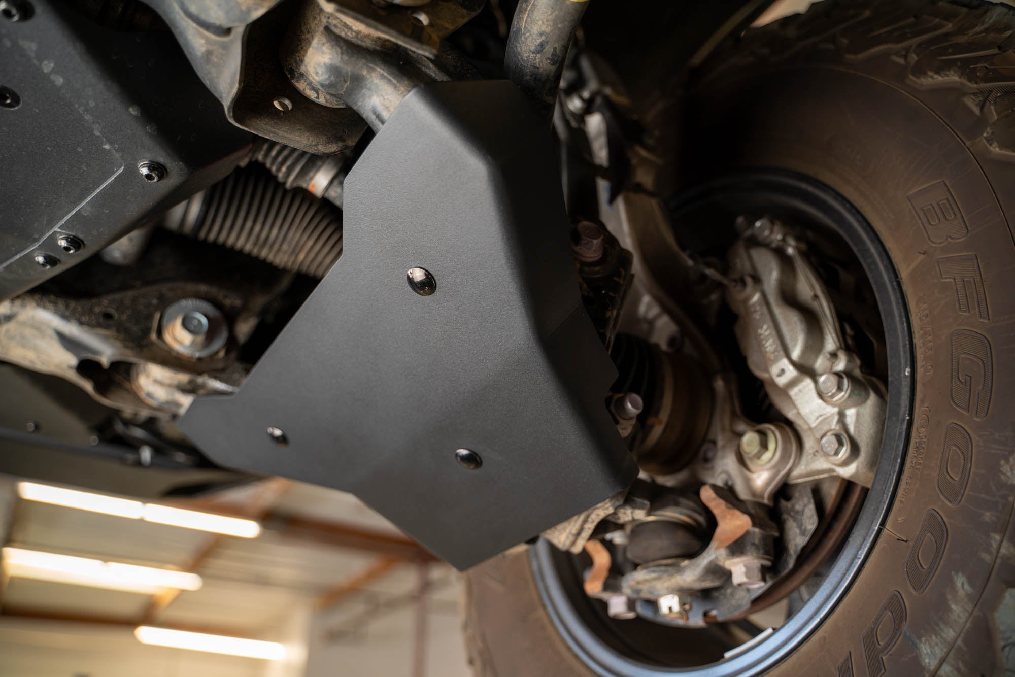 4th-gen-Toyota-Tacoma-A-Arm-Skid-Plates-Installed-2 - NVMOS
