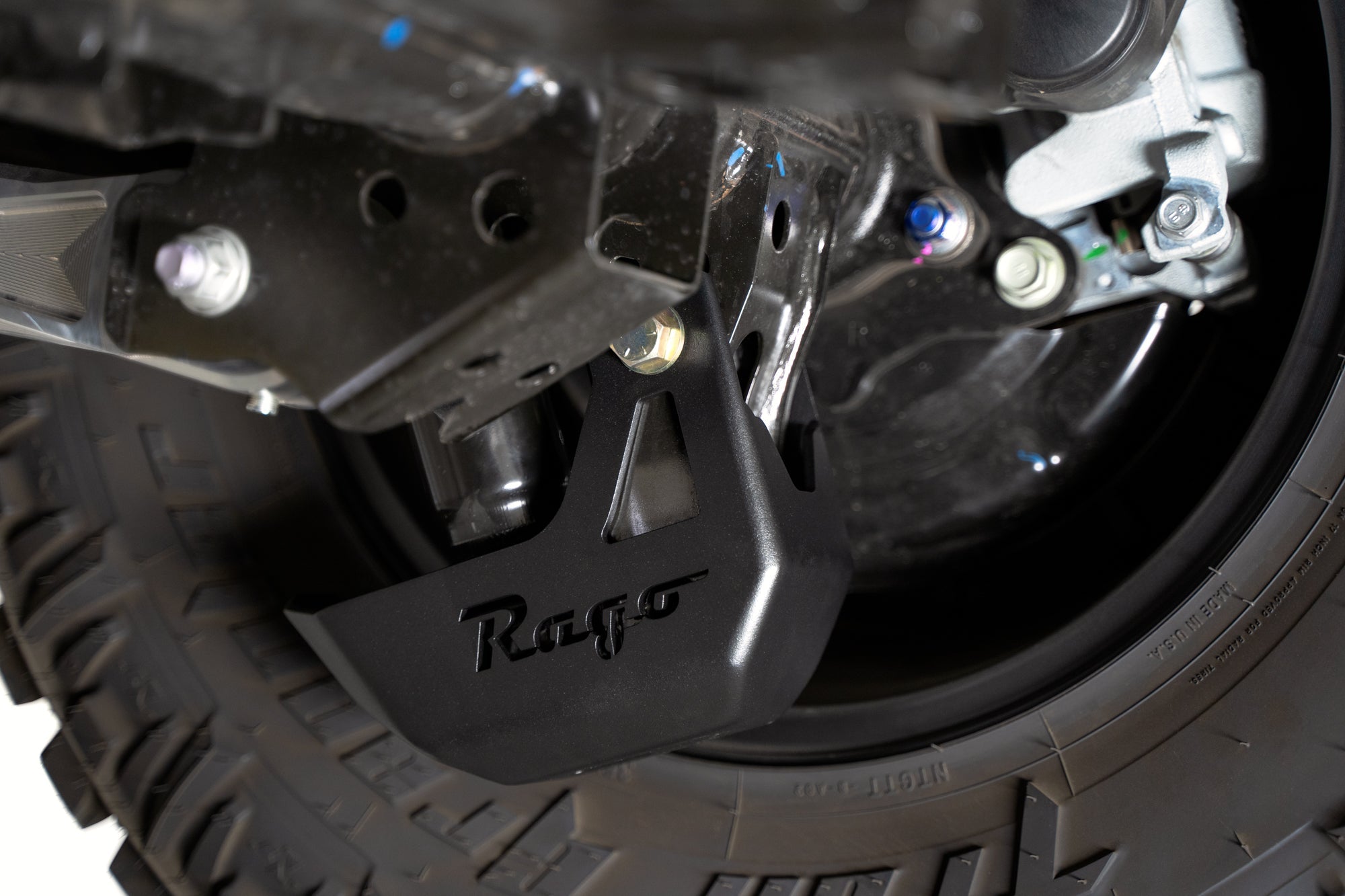 4th-gen-Toyota-Tacoma-Rear-Shock-Guards-Installed-2 - NVMOS