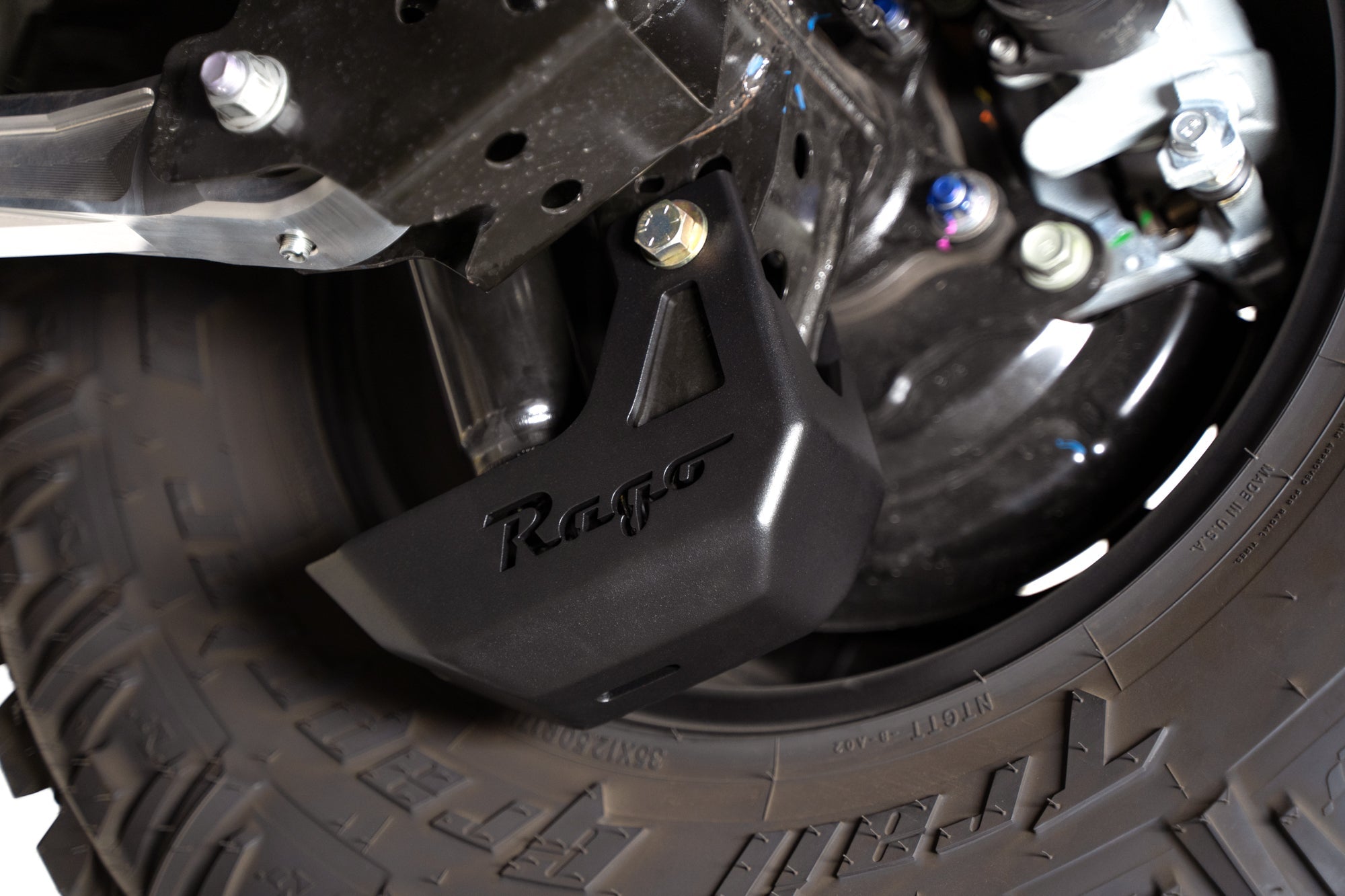 4th-gen-Toyota-Tacoma-Rear-Shock-Guards-Installed-3 - NVMOS