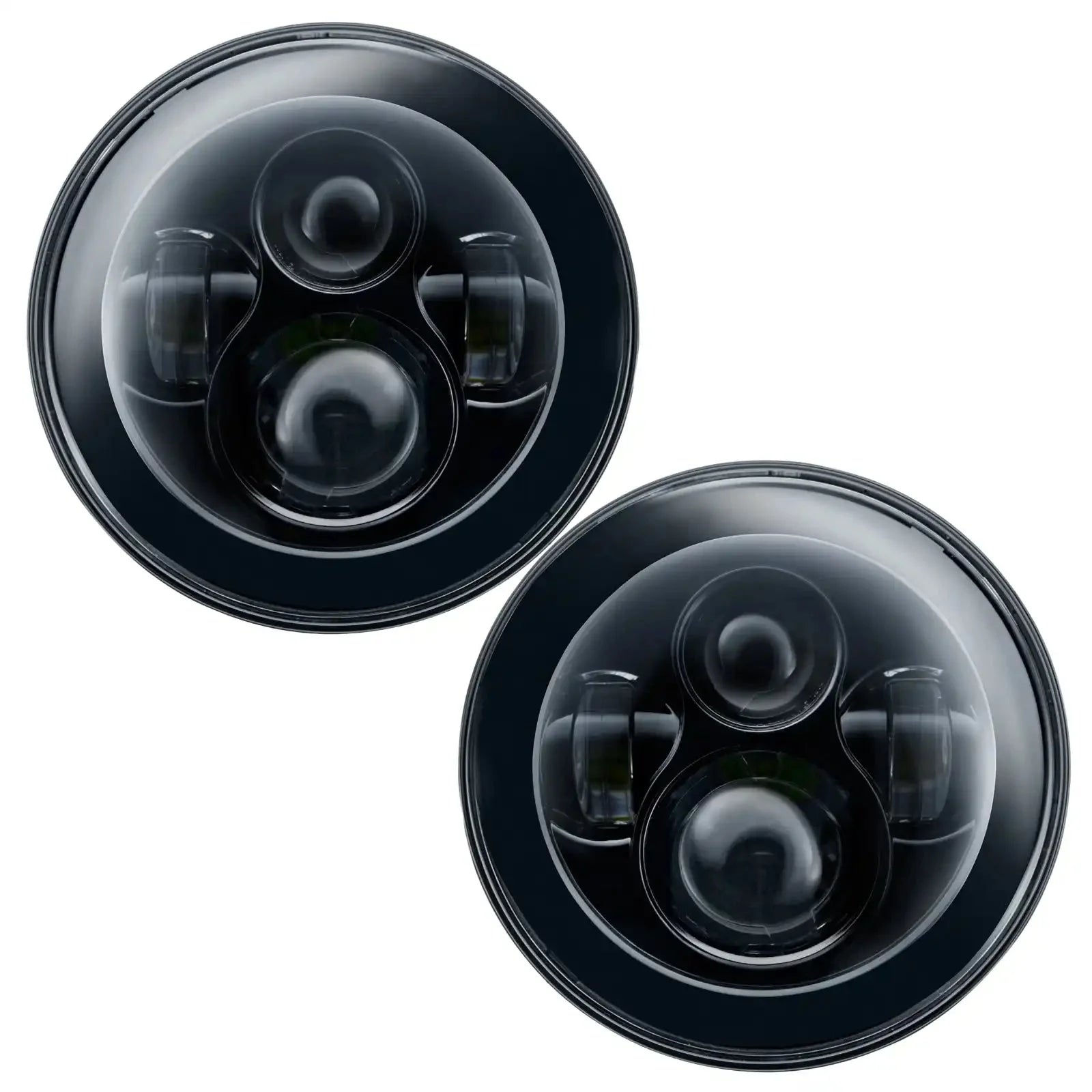 Pair of round LED vehicle headlights with black housing for off-road or overlanding vehicles