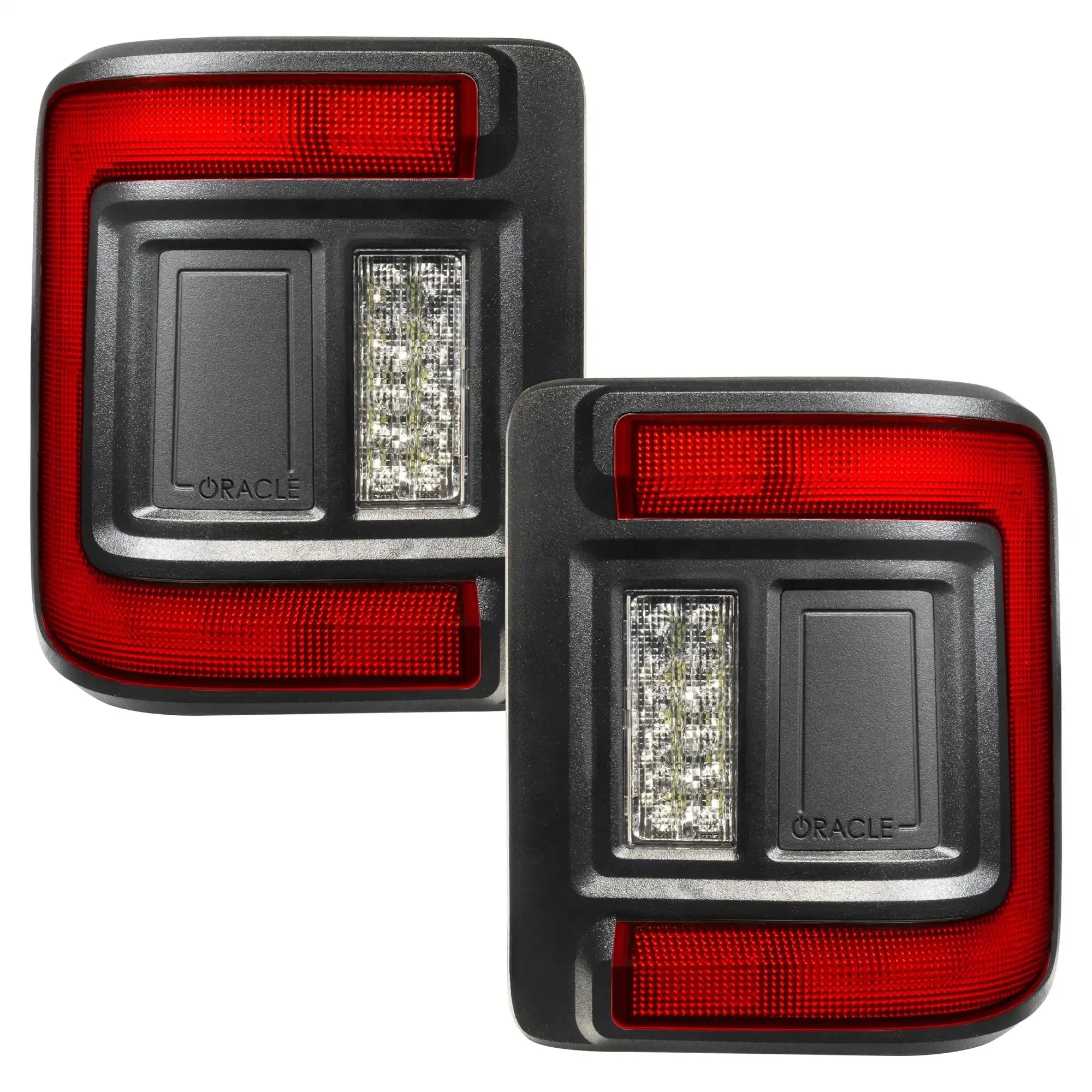 Pair of LED tail lights with red and clear lenses for off-road or expedition vehicles