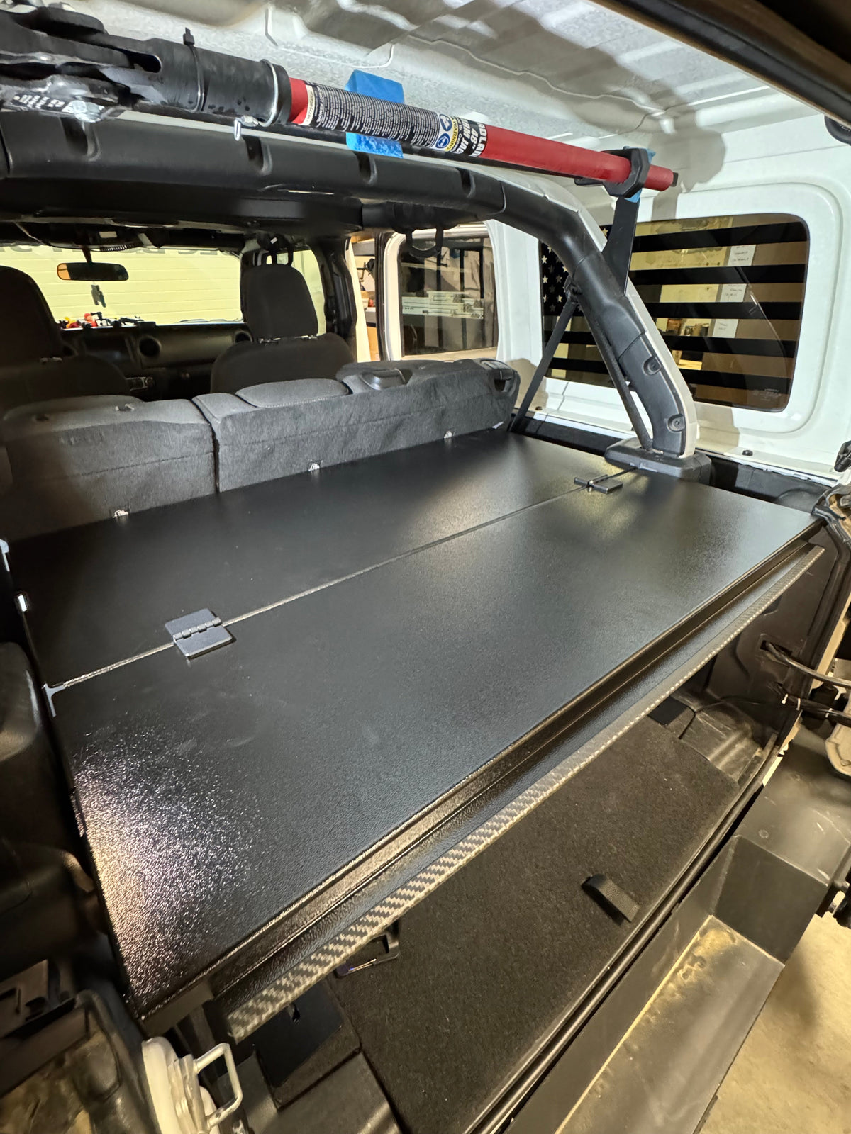 Diabolical Inc Ridgeback security enclosure in a Jeep Wrangler JLU
