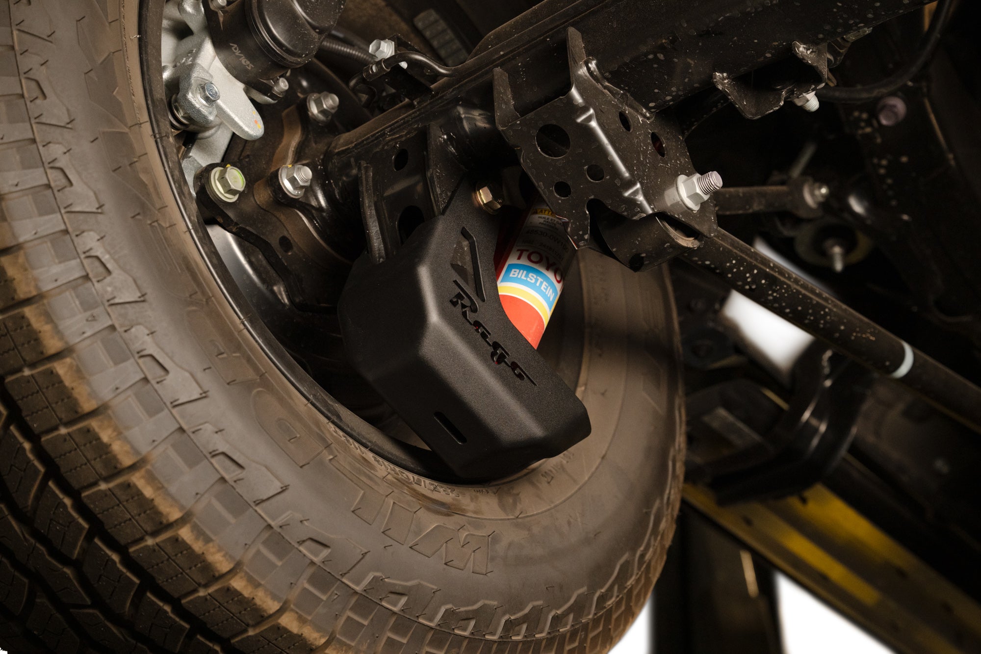 6th-Gen-4Runner-Rear-Shock-Guards-On-Lift-2 - NVMOS