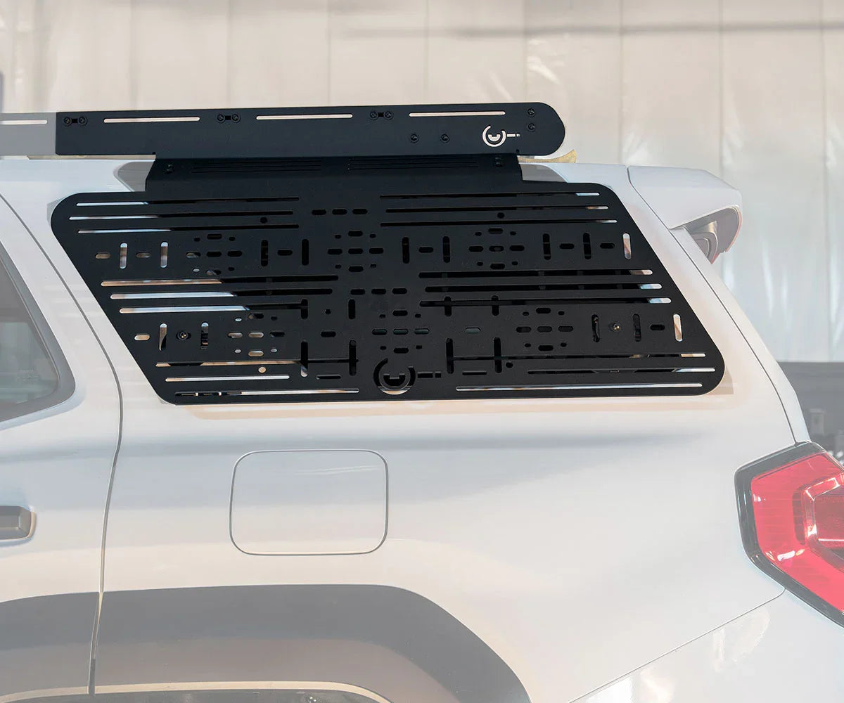 Toyota 4Runner with modular side window molle panel and roof rack accessory mount