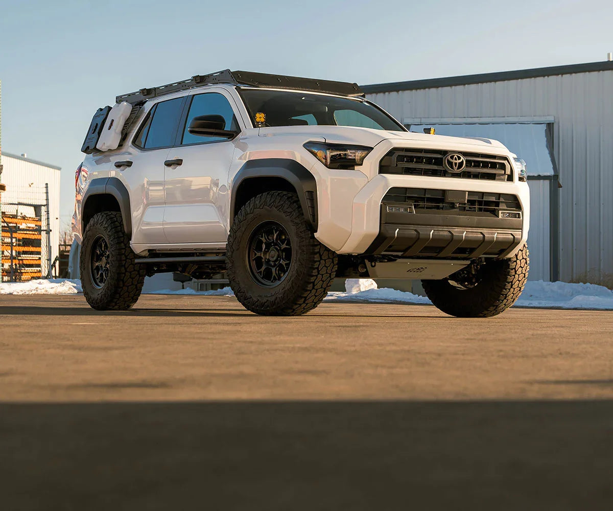 Toyota 4Runner overland SUV with roof rack, off-road tires, and expedition accessories outdoors