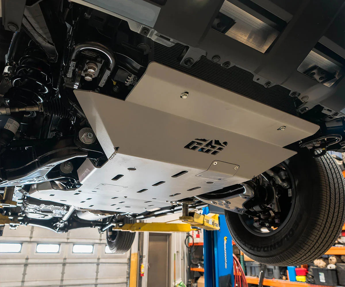 Toyota 4Runner skid plates installed, heavy-duty undercarriage protection, workshop setting