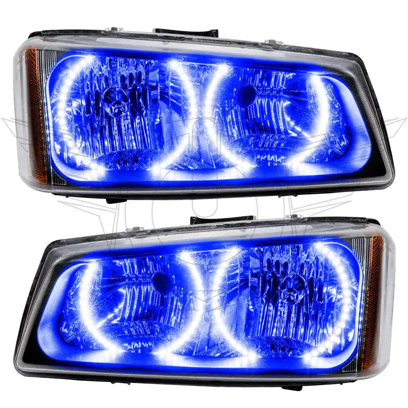 Pair of blue LED halo headlights for Toyota Tacoma trucks, clear lens, modern upgrade