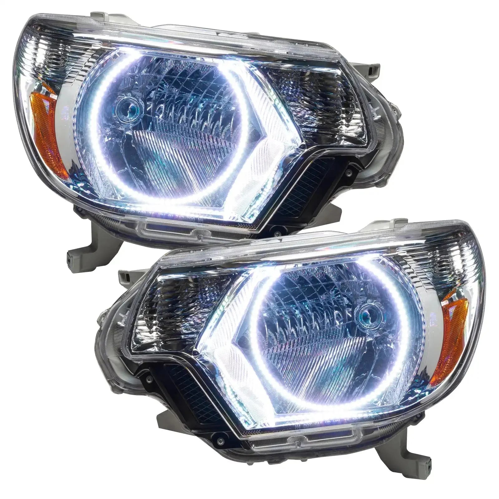 Pair of LED halo projector headlights for Toyota Tacoma, clear lens with chrome housing.