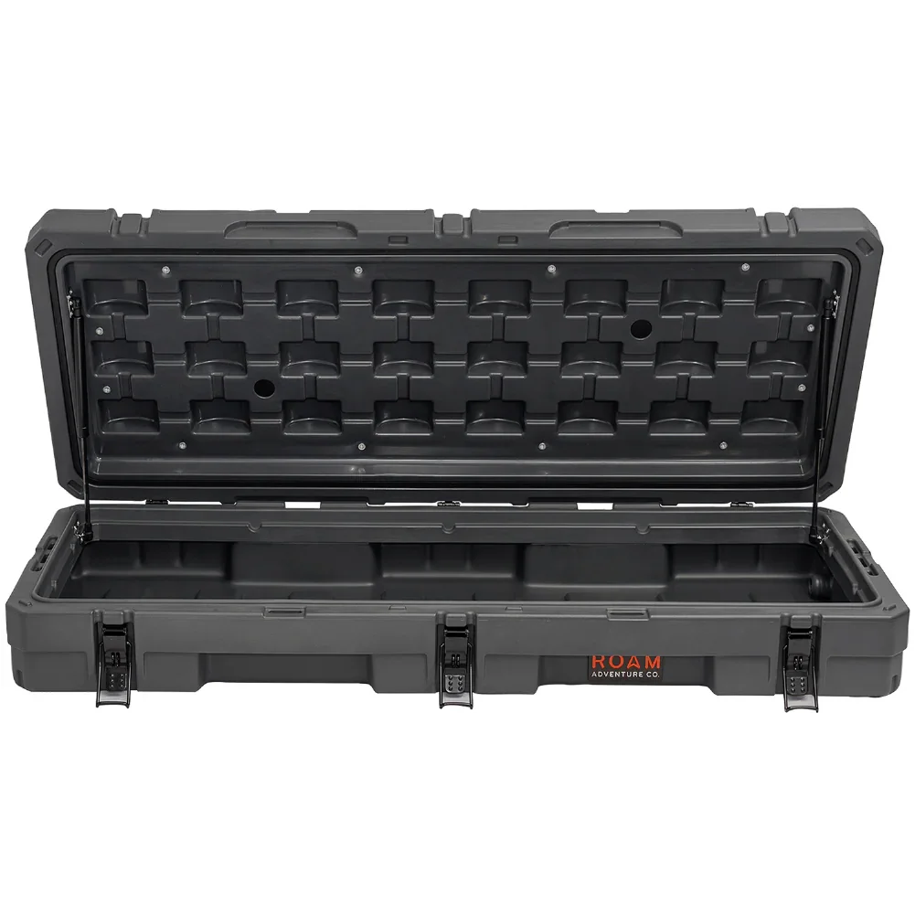 Black heavy-duty overland storage case with open lid and secure latches, ideal for camping gear