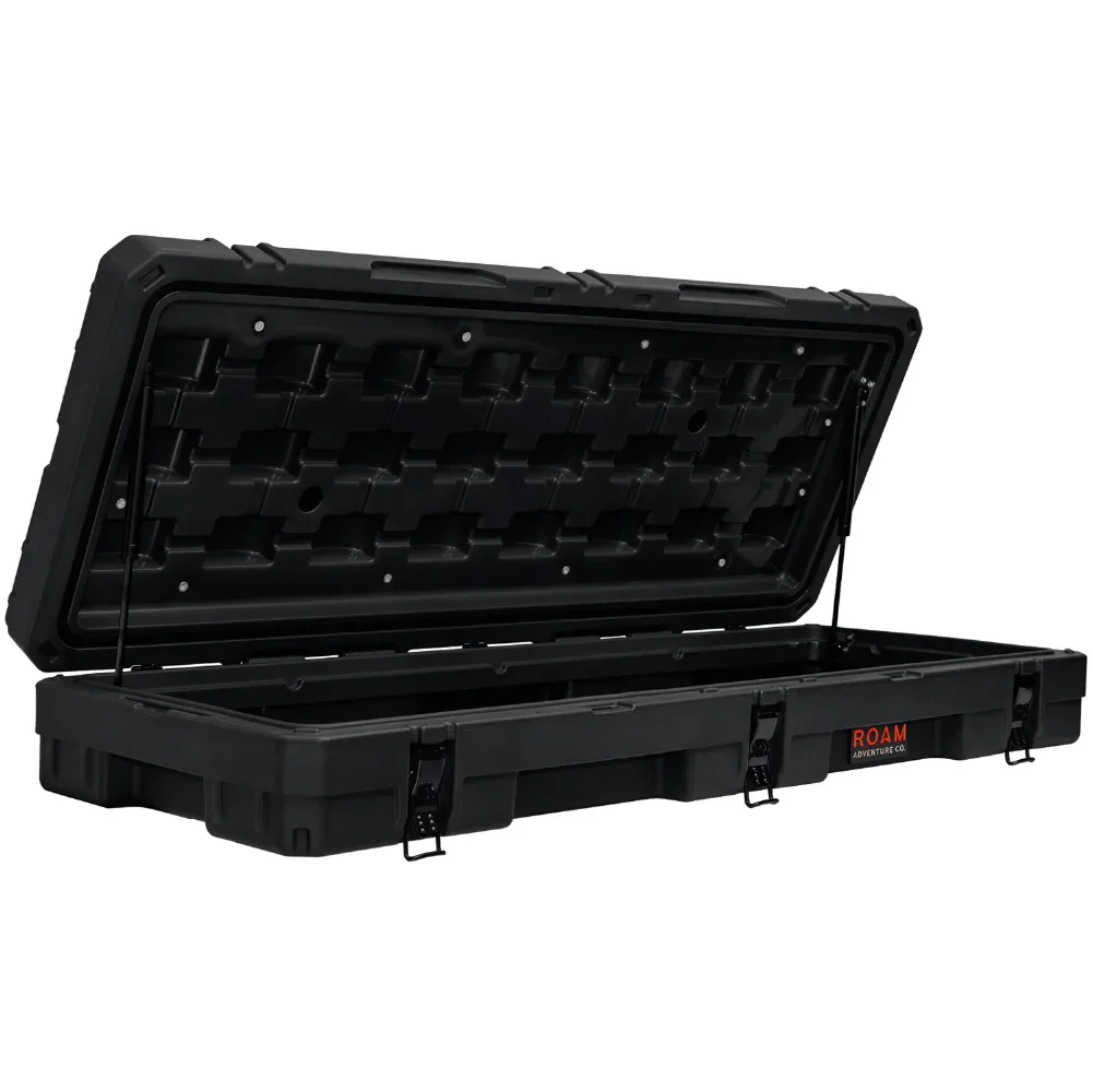 Black rooftop cargo box with open lid for overlanding and expedition gear storage