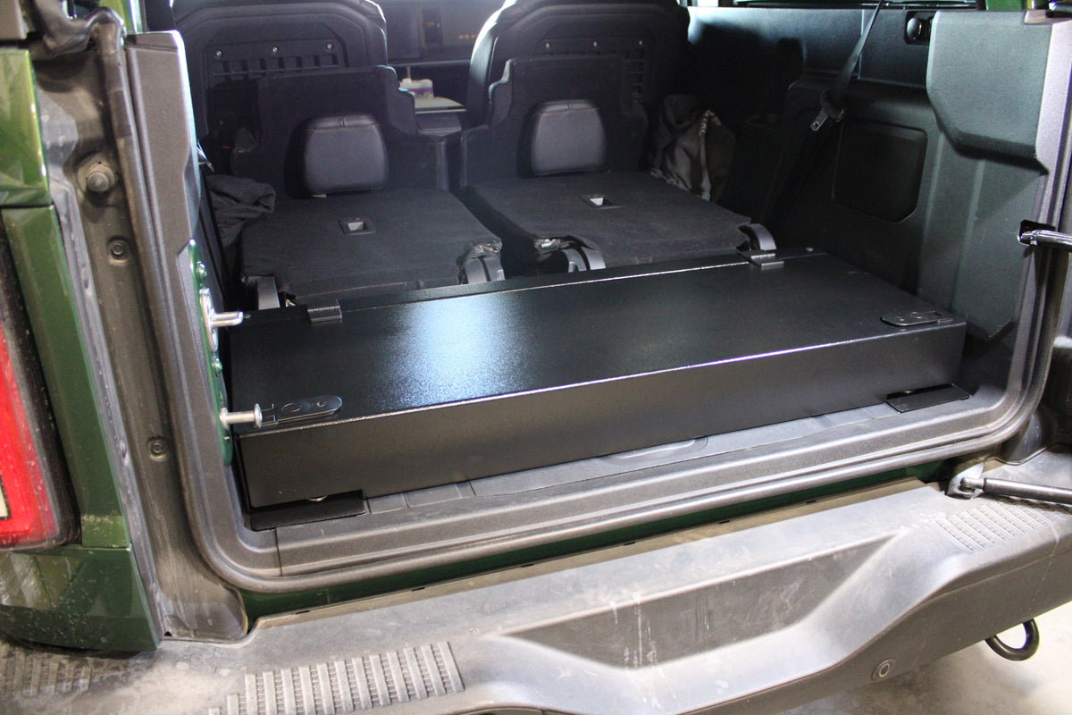 Diabolical Inc Stage 2.0 cargo platform in a Ford Bronco 2-door