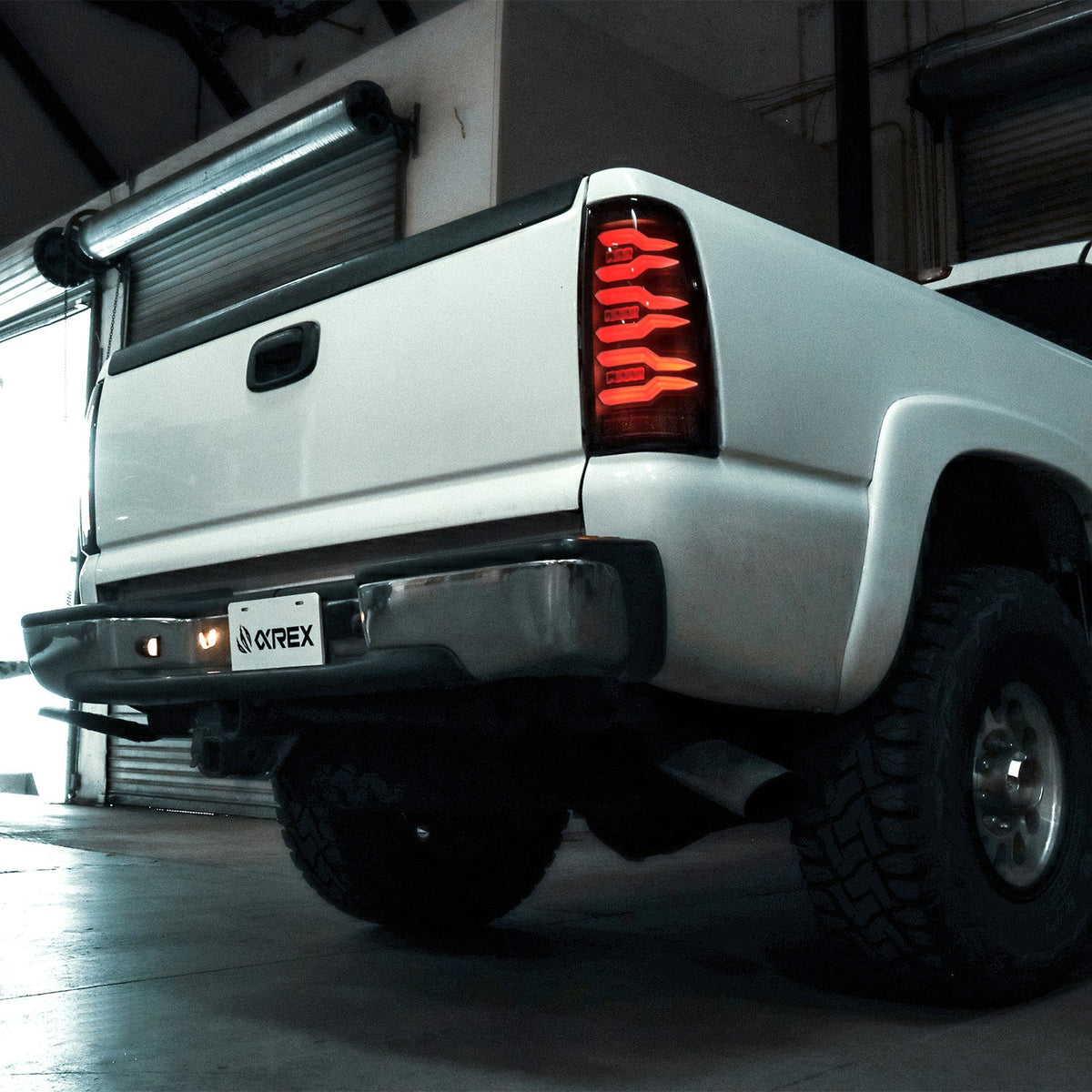 AlphaRex LUXX-Series LED Tail Lights for Chevrolet Silverado 1500 / Chevrolet Silverado HD 2500/3500 - Black Red