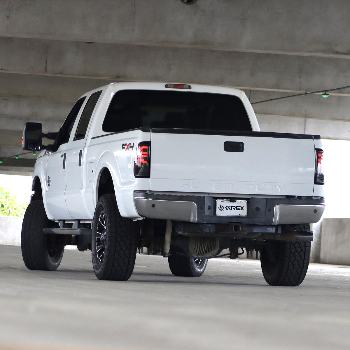 AlphaRex LUXX-Series LED Tail Lights for Ford Super Duty / Ford F-150 - Black Red