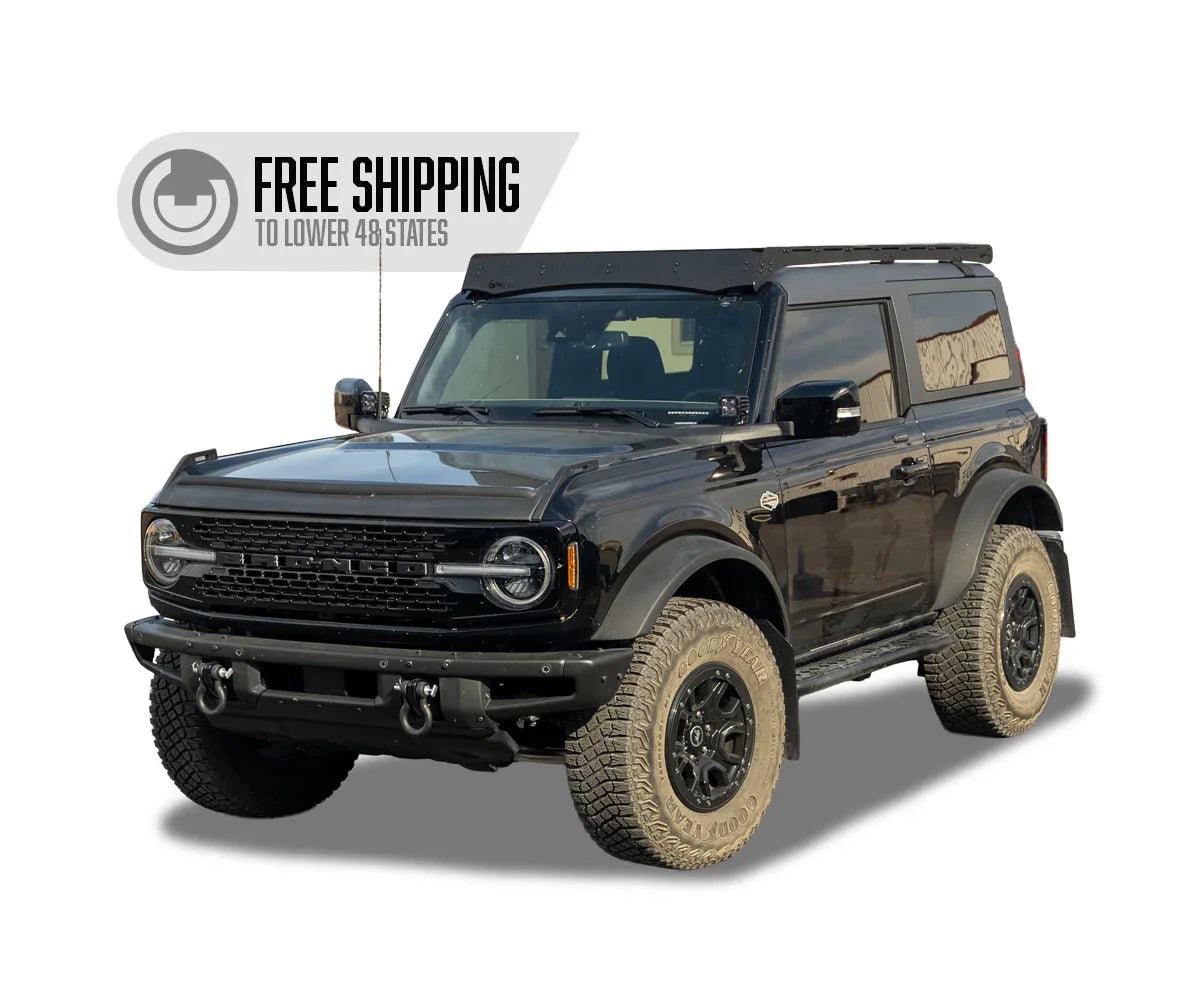 Black Ford Bronco with Prinsu roof rack, off-road tires, adventure vehicle accessories