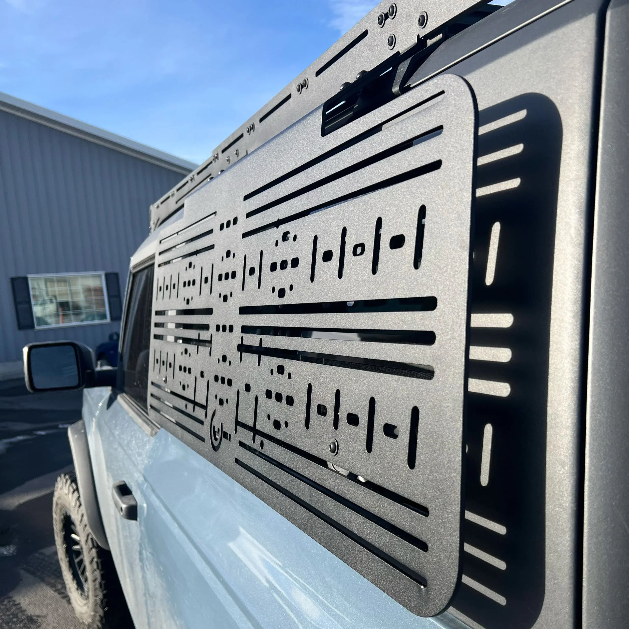 Ford Bronco with modular side molle panel accessory for overlanding gear storage