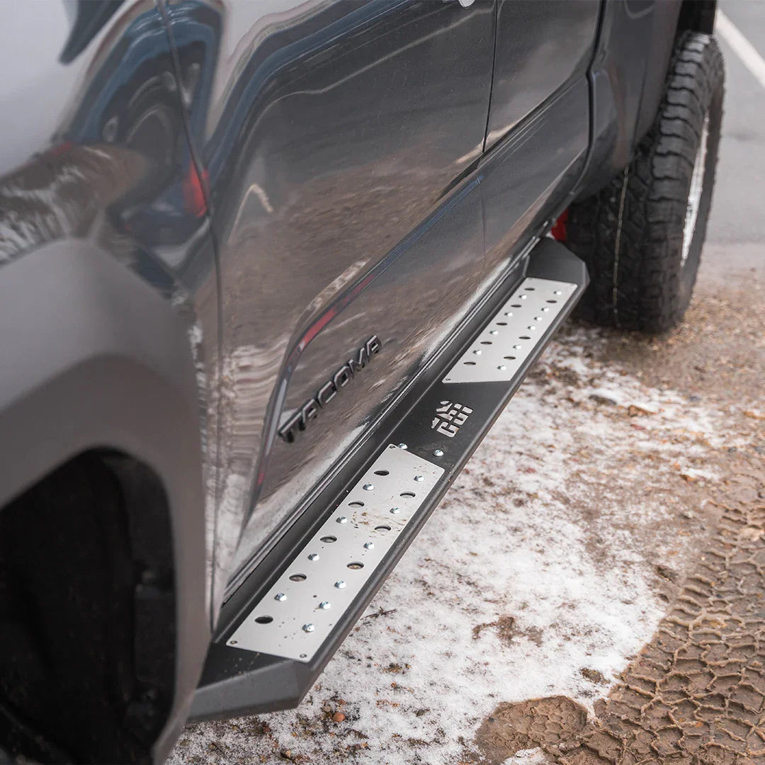 Toyota Tacoma with metal side step running boards for off-road and overlanding