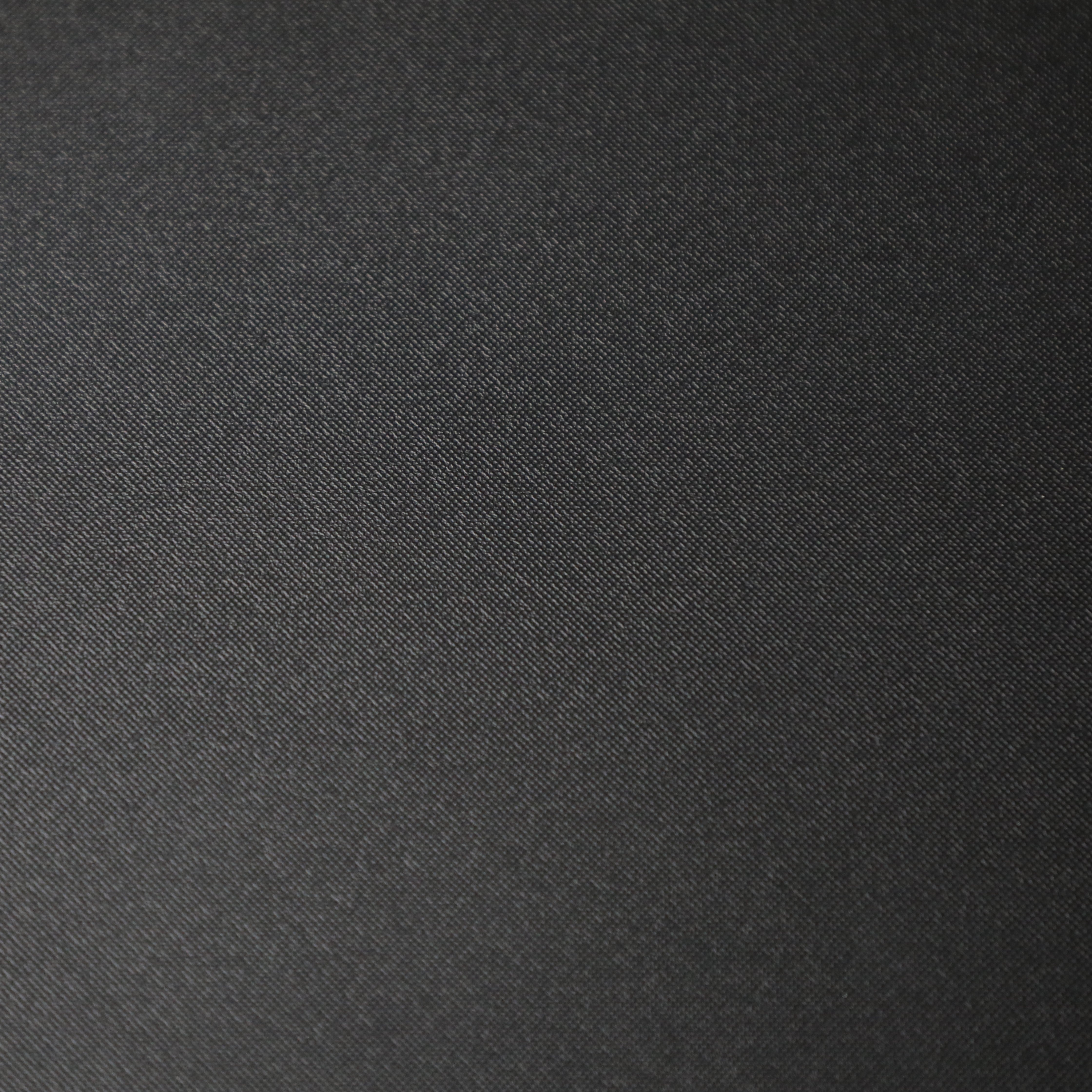 Close-up of black fabric texture for overlanding and camping gear accessories