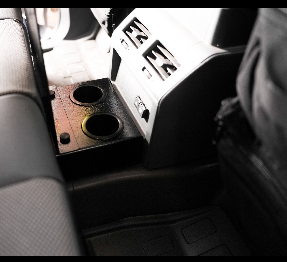 Diabolical Inc rear seat cupholders installed in an Ineos Grenadier