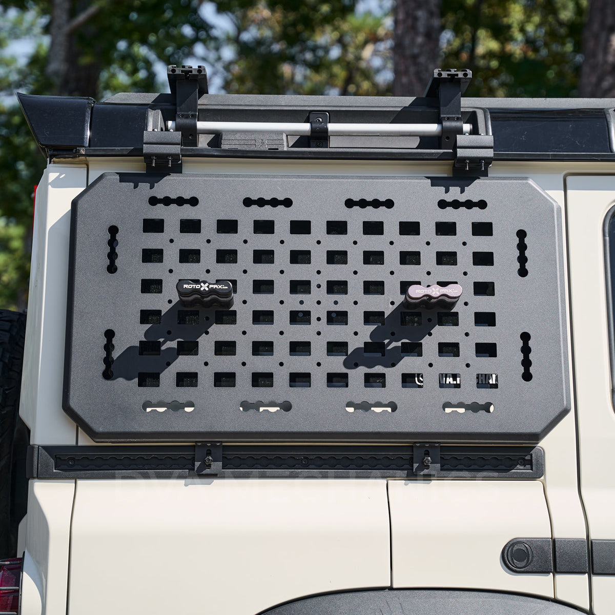 INEOS Grenadier exterior MOLLE panel with L-Track and RotopaX pattern