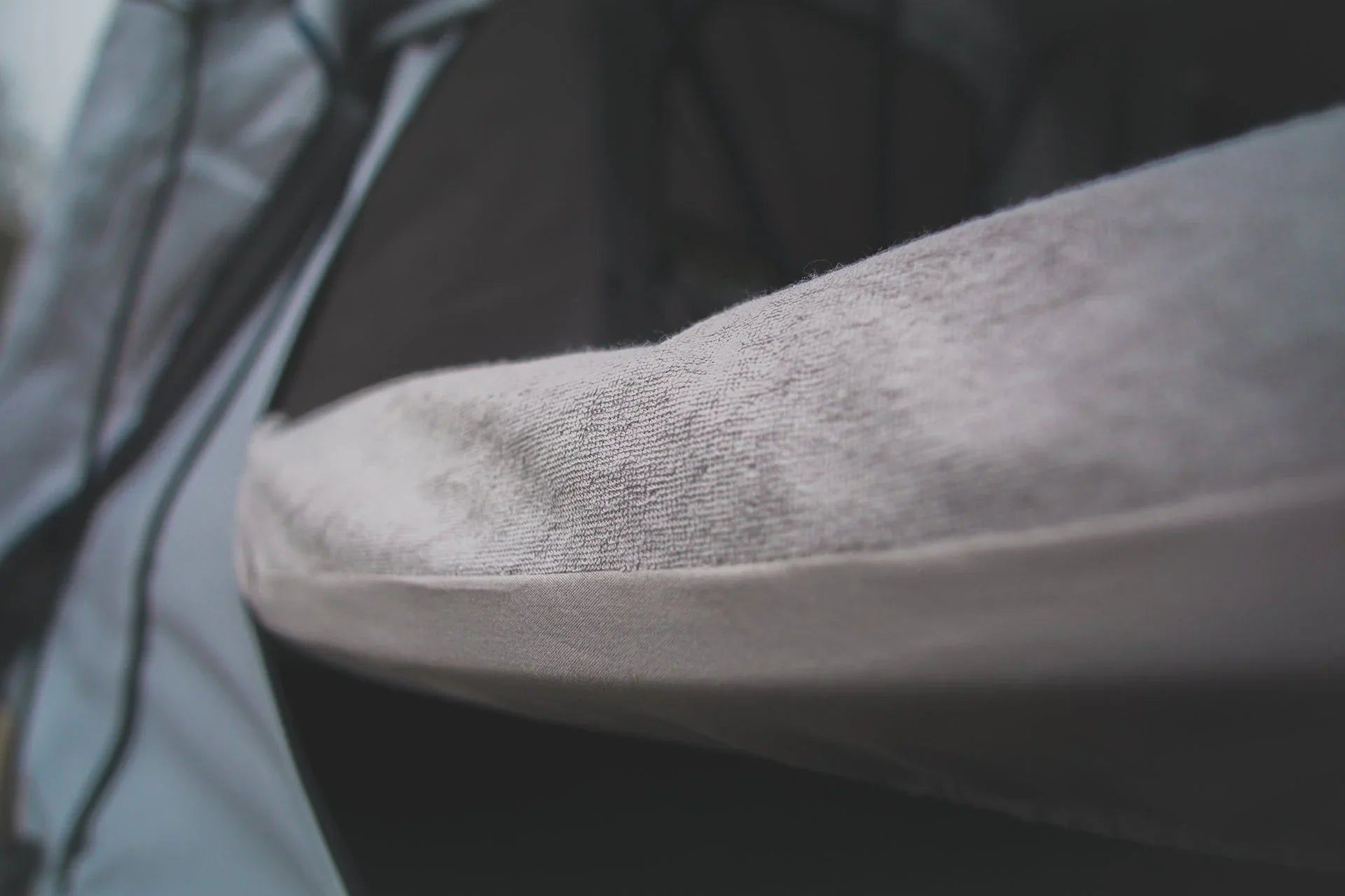 Close-up of rugged outdoor tent fabric and seams for overlanding or expedition camping