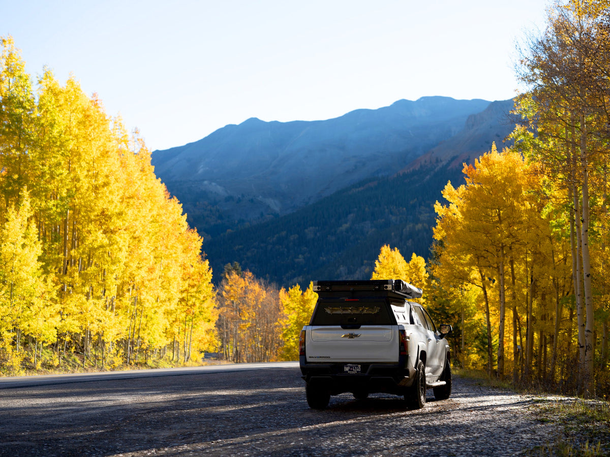 Dirtbox Overland EV pass-through canopy camper for Chevy Silverado EV and GMC Sierra EV