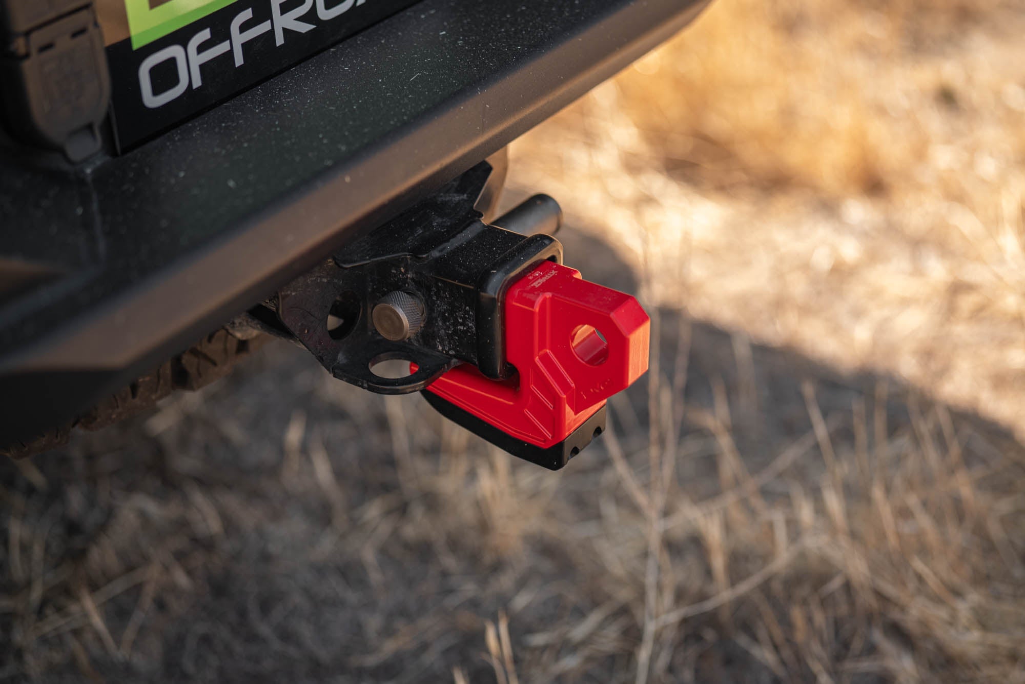 DV8-Xtract-Hitch-Skid-Plate-Red-Installed-3 - NVMOS