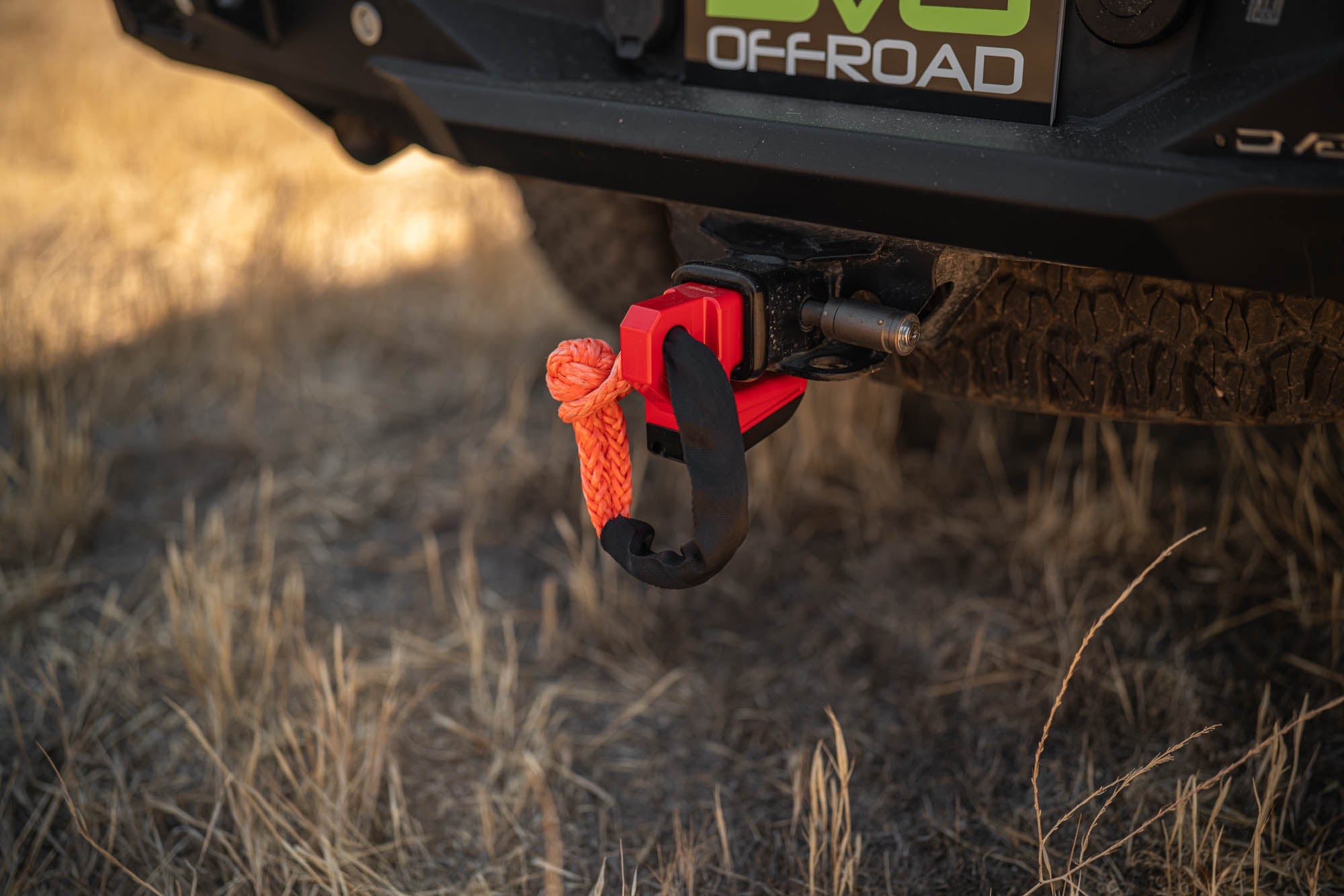 DV8-Xtract-Hitch-Skid-Plate-Red-Installed-4 - NVMOS