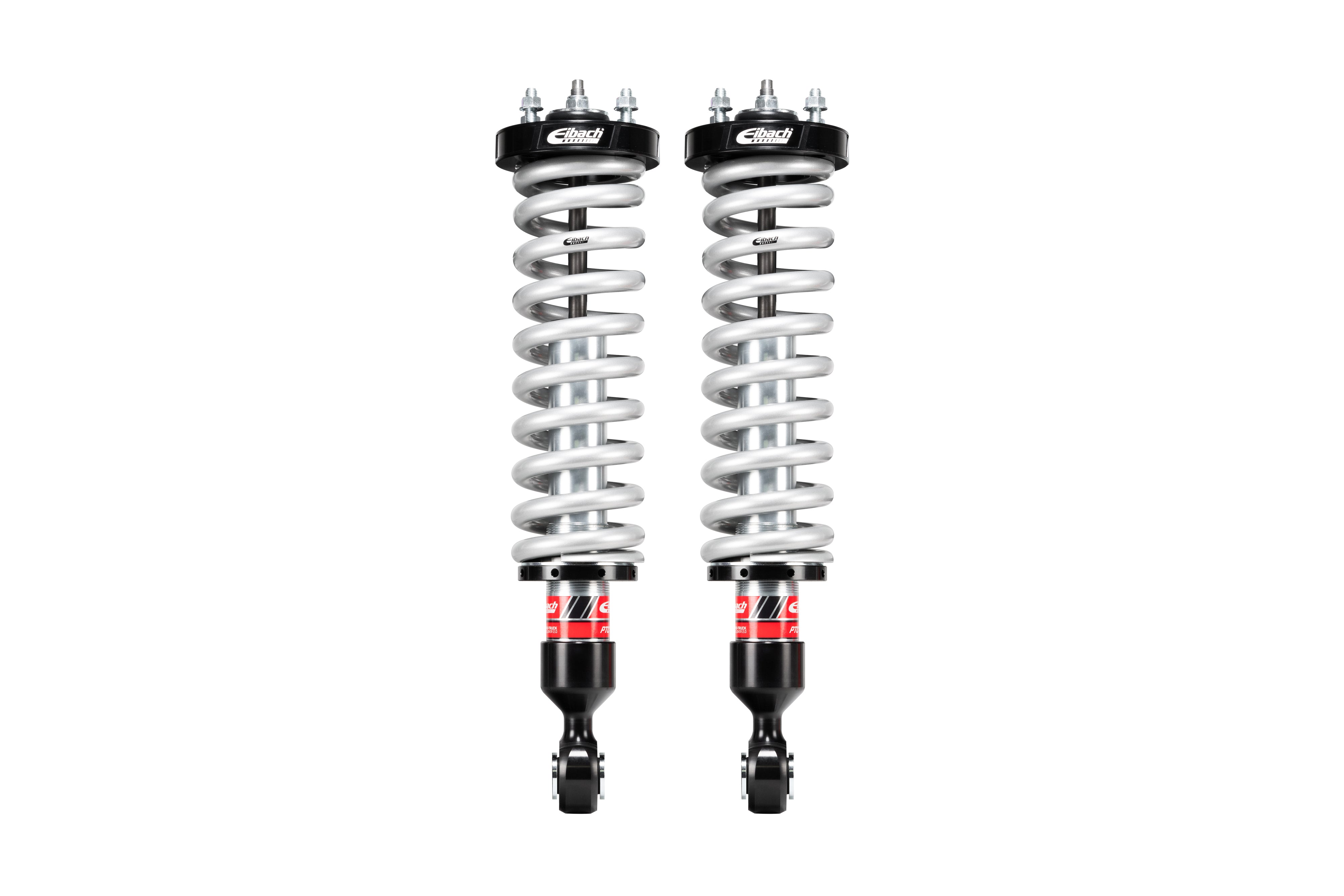 Pair of heavy-duty silver coilover shocks for off-road vehicles and overlanding