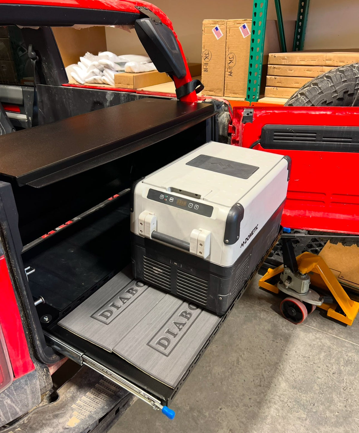 Diabolical Inc Locker Slide Tray extended in a Ford Bronco 2-door