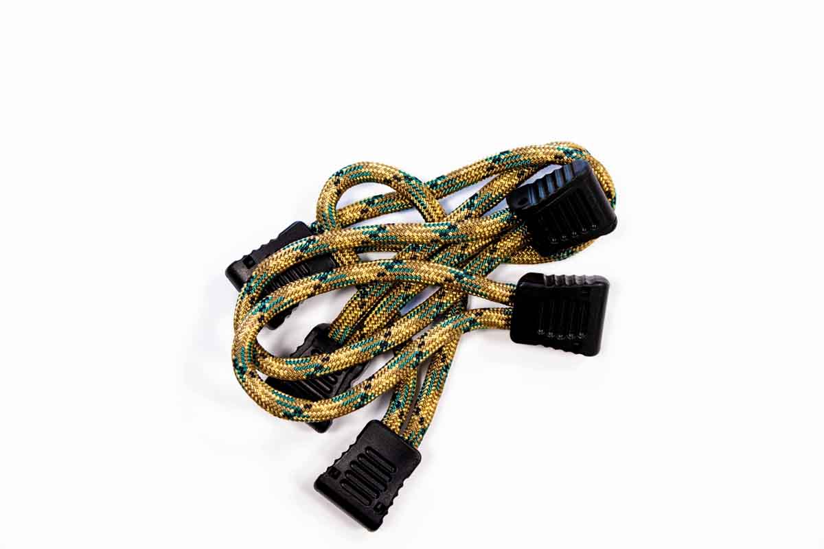 Heavy-duty yellow bungee cord with black plastic hooks for camping and overlanding gear