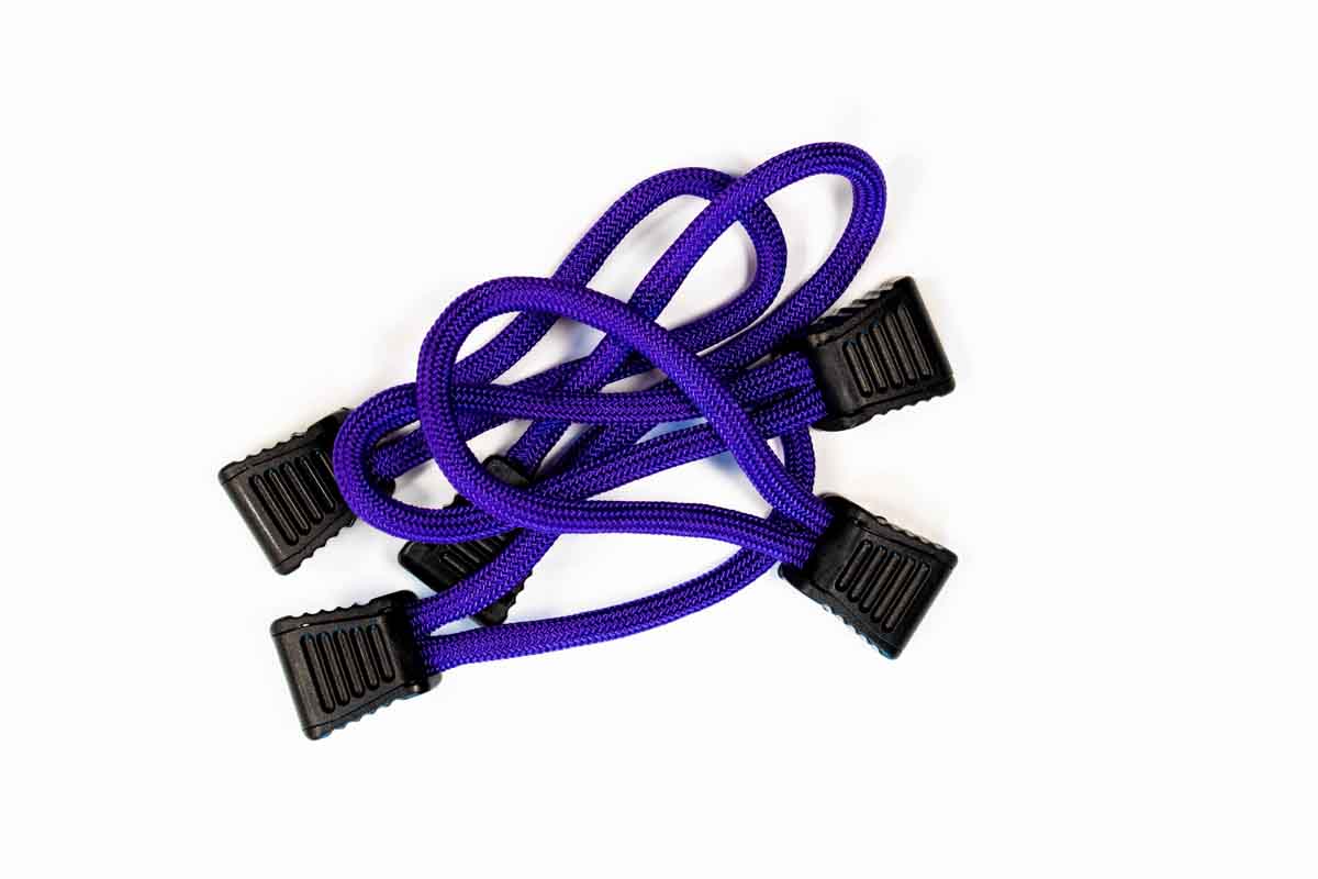 Purple utility bungee cords with black plastic clips for camping or overlanding gear